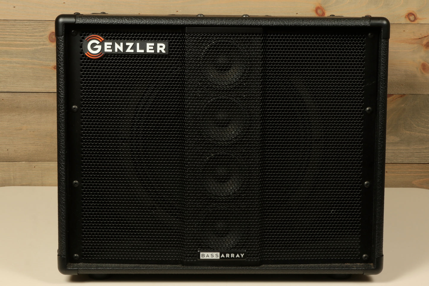 Genzler Bass Array Bass Guitar Amplifier in black, front view showcasing speaker grille and logo