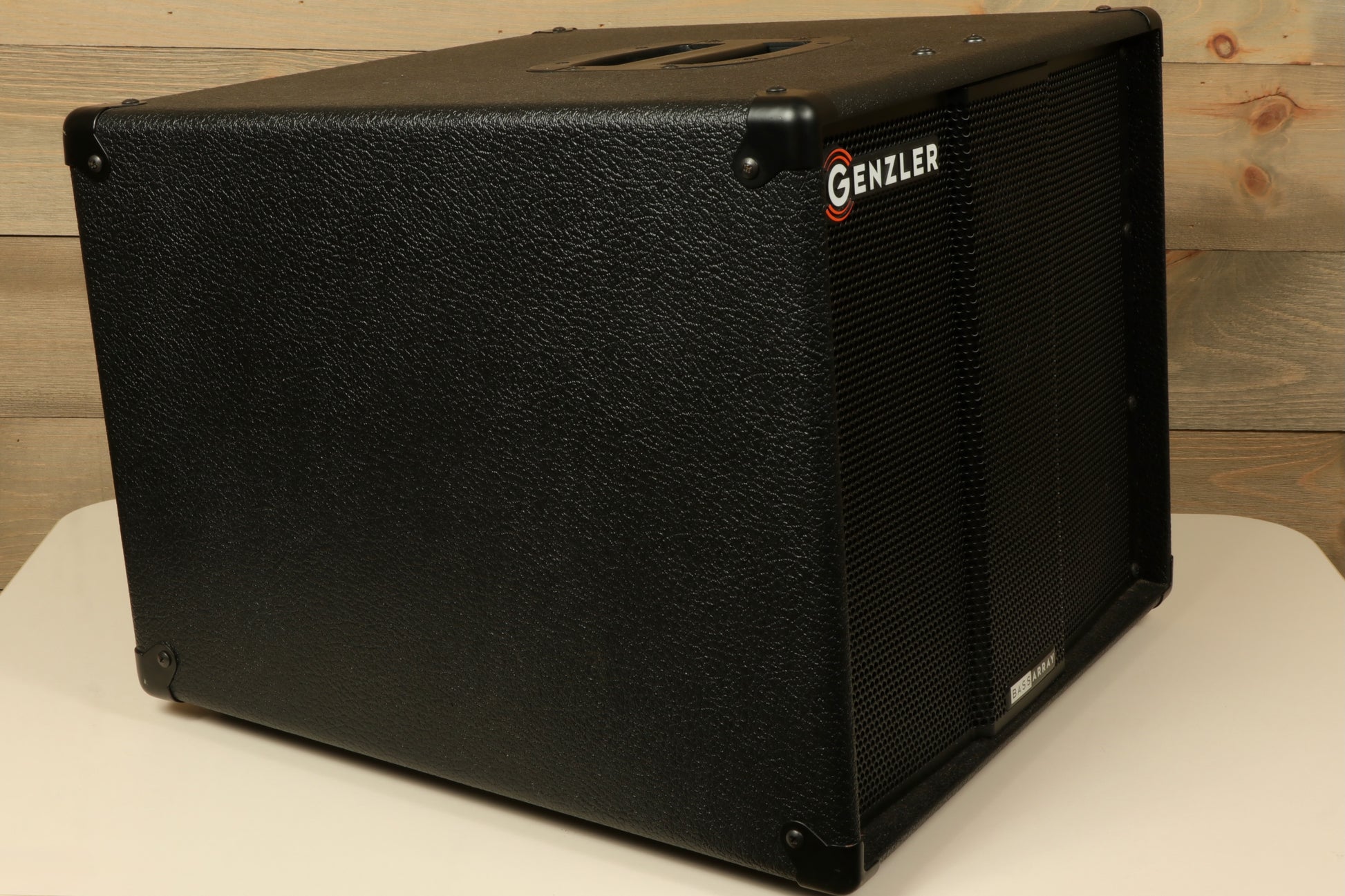 Genzler Bass Guitar Amplifier in black finish, side view showcasing bass cabinet design