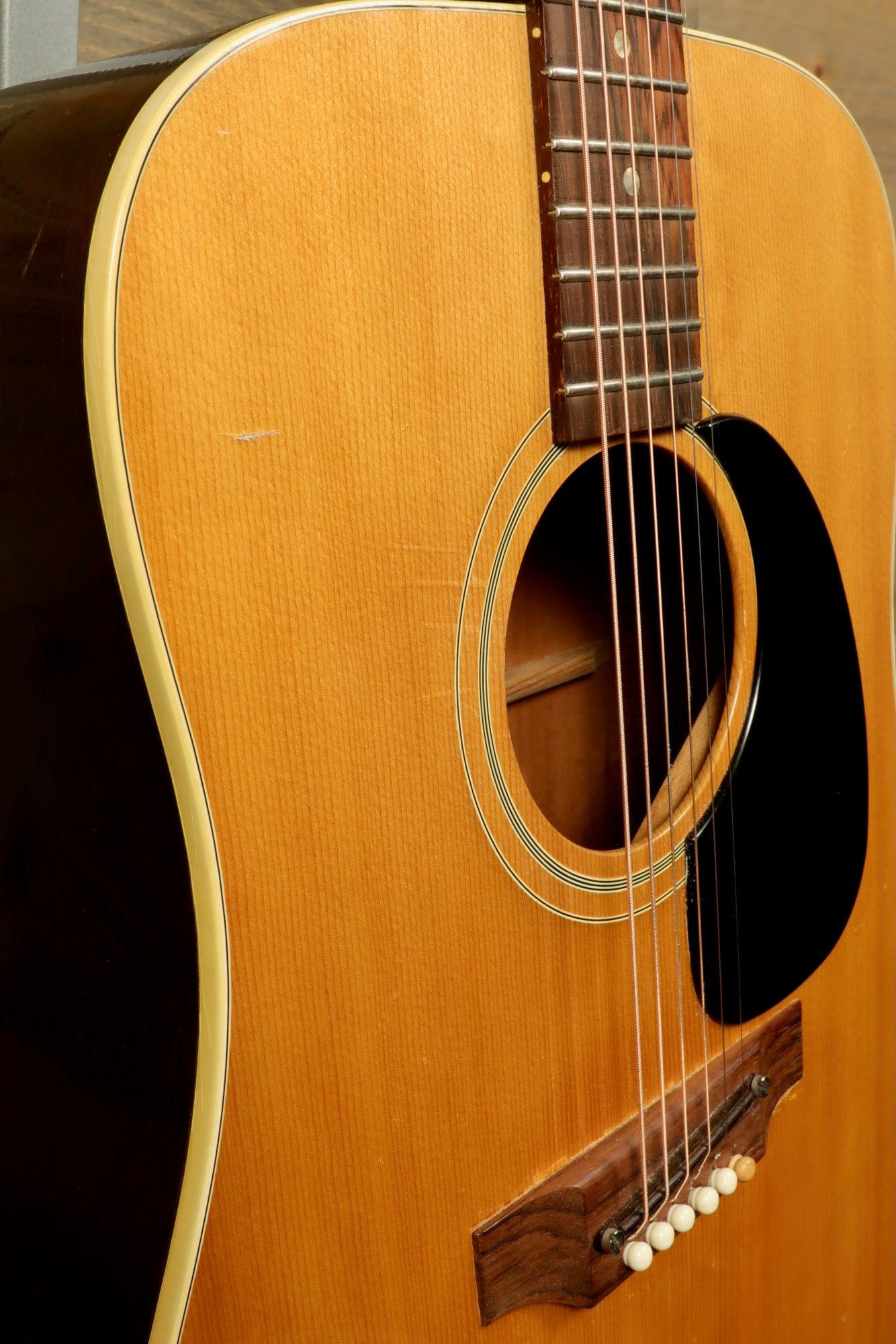 1968 Gibson J-50 Deluxe for sale, showcasing its natural finish and classic acoustic design