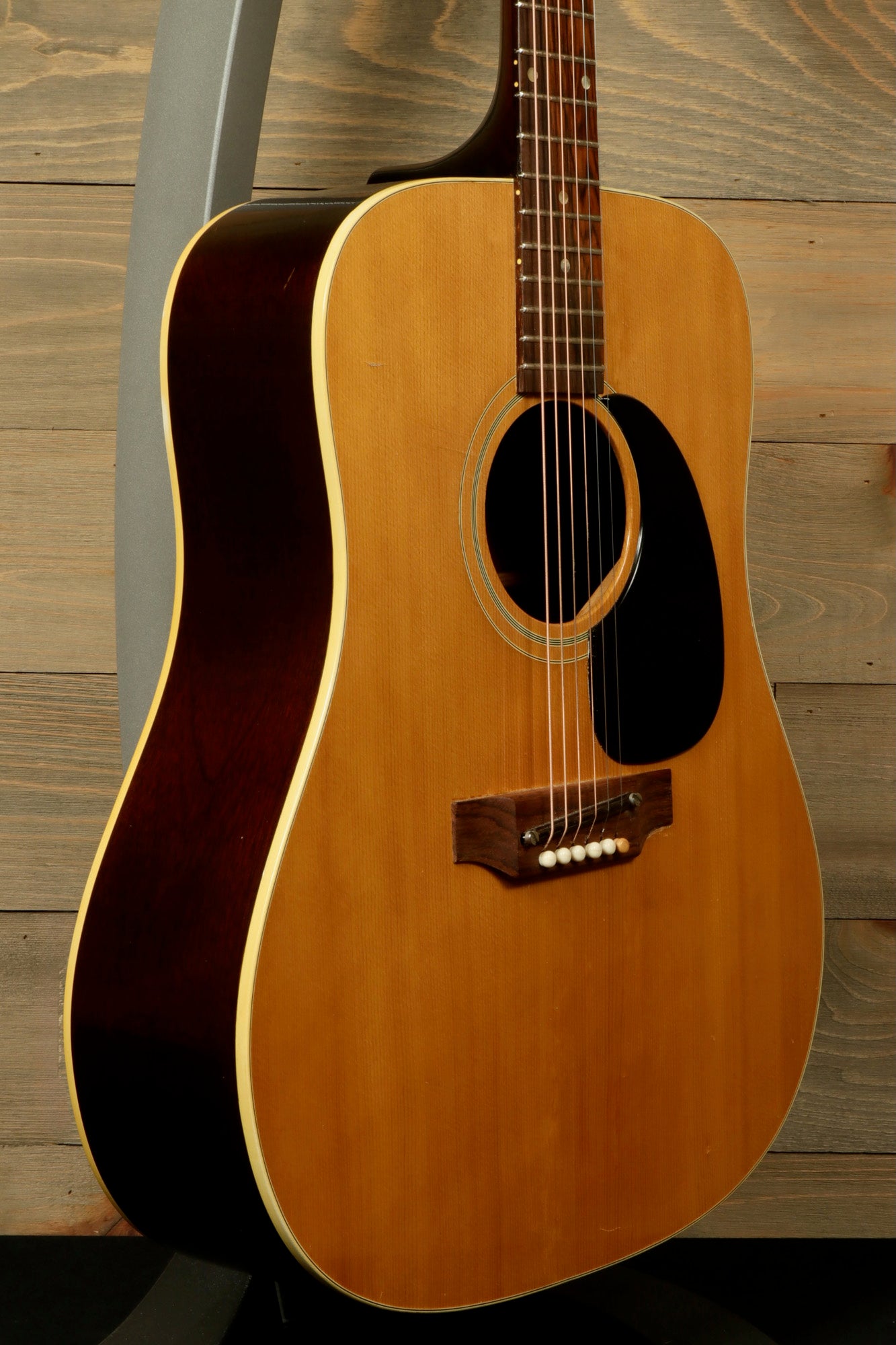 1968 Gibson J-50 Deluxe for sale, featuring a classic finish and traditional acoustic design