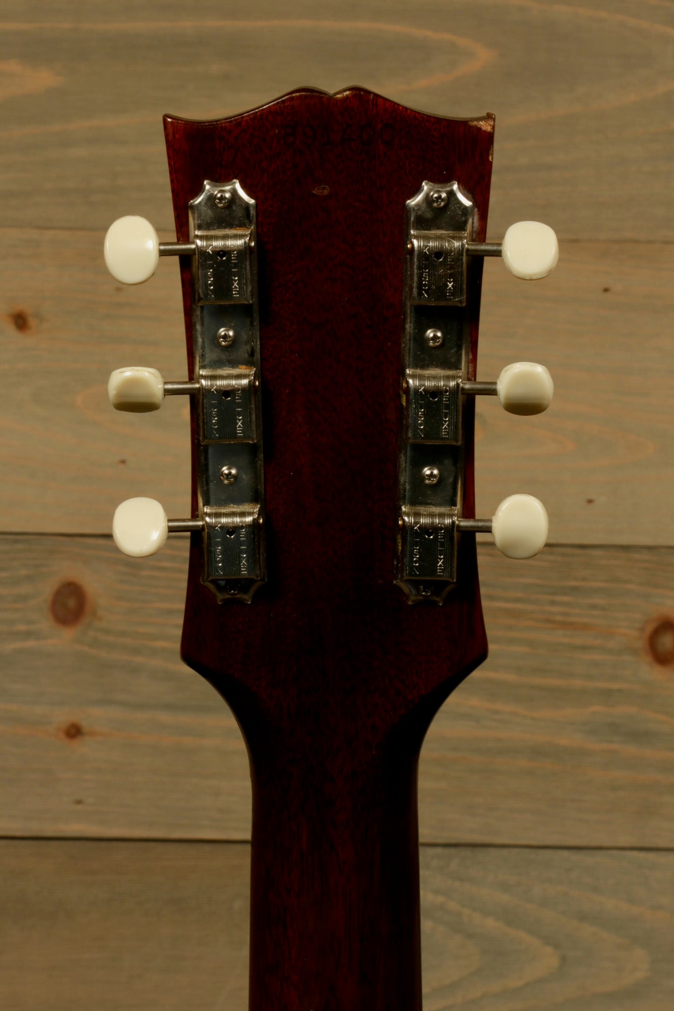 Back view of 1968 Gibson J-50 Deluxe for sale with classic tuning pegs and smooth finish