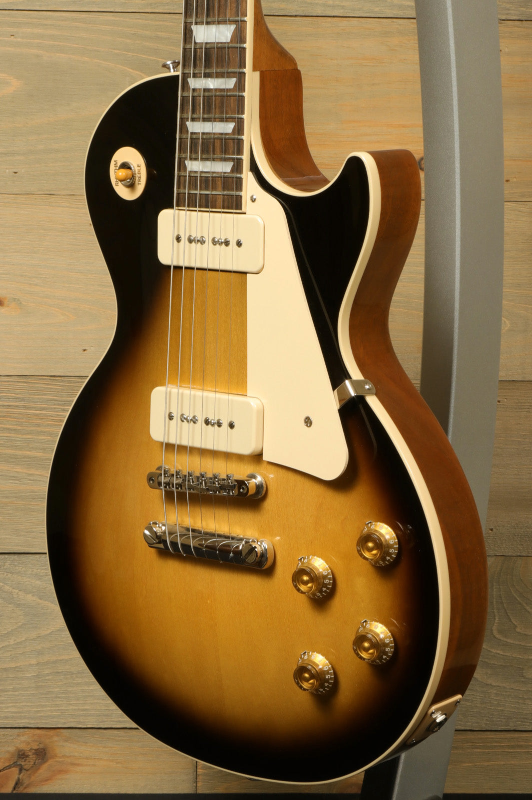 Gibson Les Paul Standard 50s P-90 in sunburst finish, side view highlighting the body and pickups