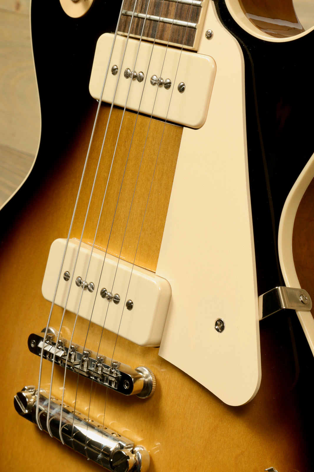 Gibson Les Paul Standard 50s P-90 in sunburst finish, close-up view of pickups and bridge
