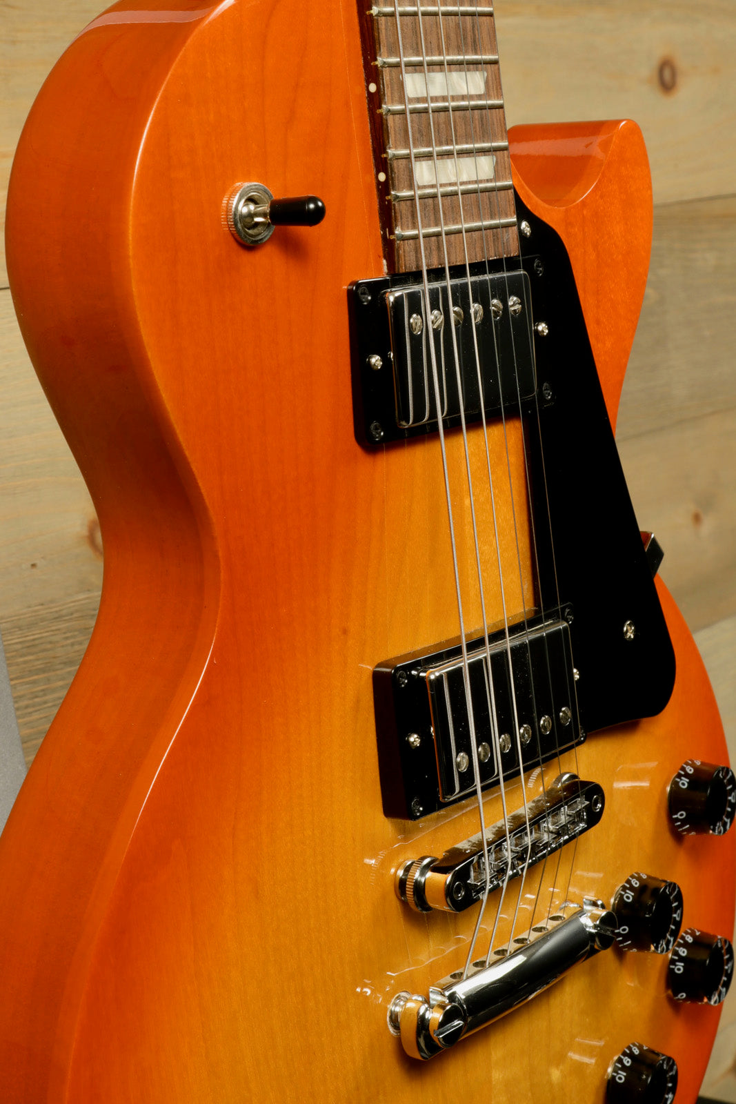 Gibson Les Paul Studio sunburst finish, side view showcasing quality craftsmanship