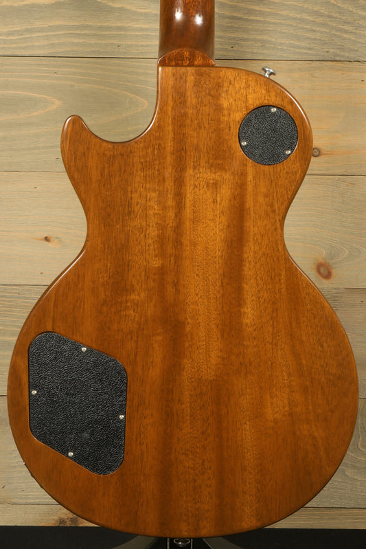 Back view of a used 2016 Gibson Les Paul Traditional Plus showcasing its beautiful wood finish