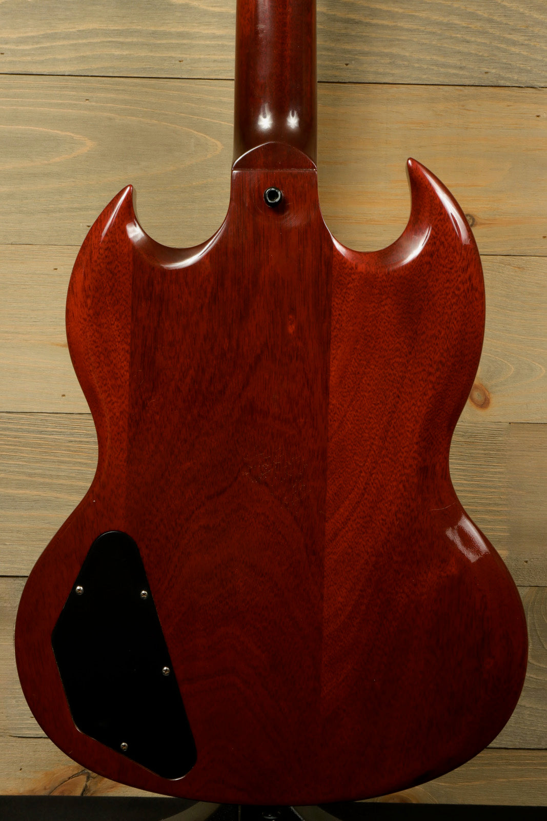 Gibson SG Special in vintage cherry, back view showcasing smooth finish and contours