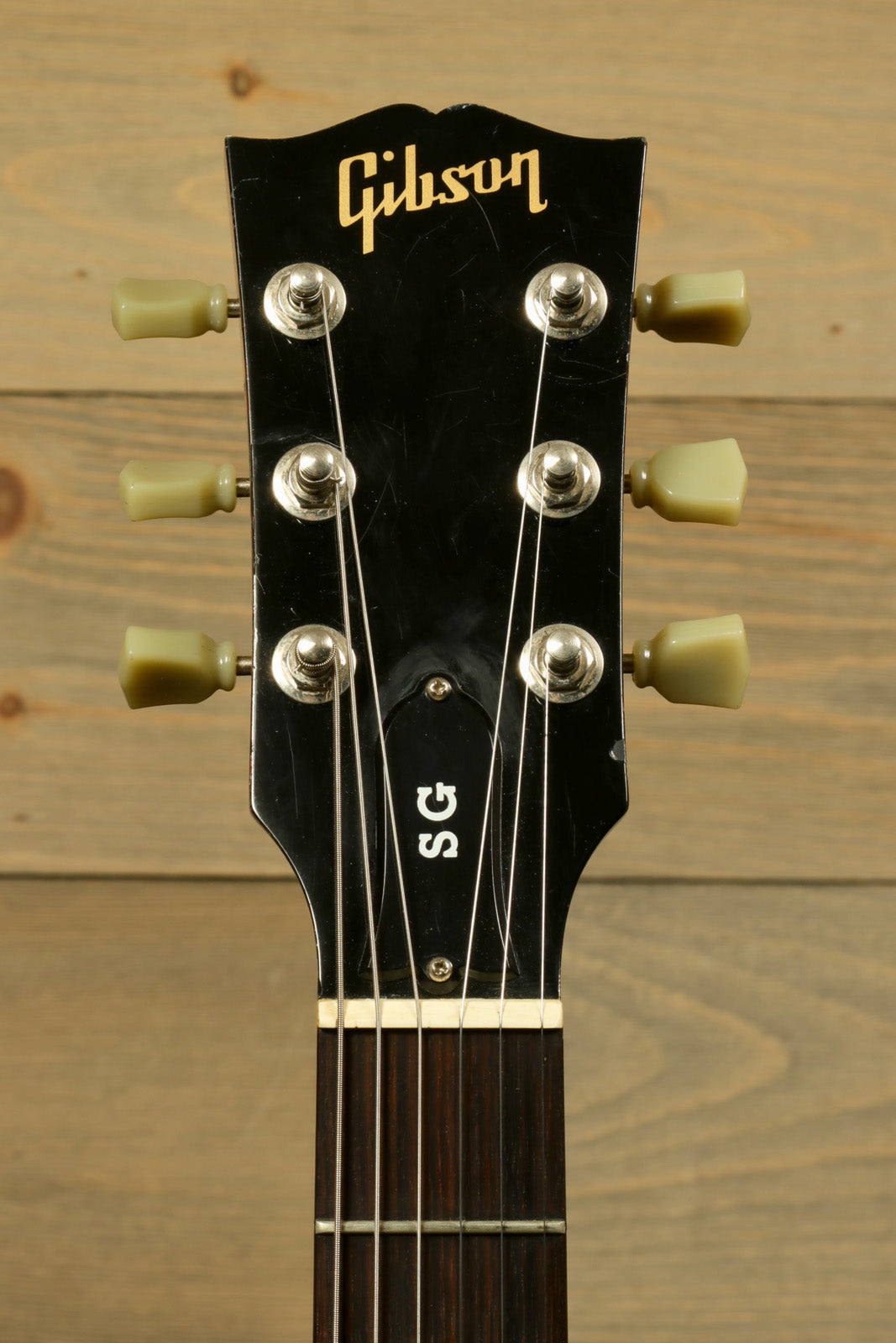 Gibson SG Special black headstock with chrome machine heads, front view