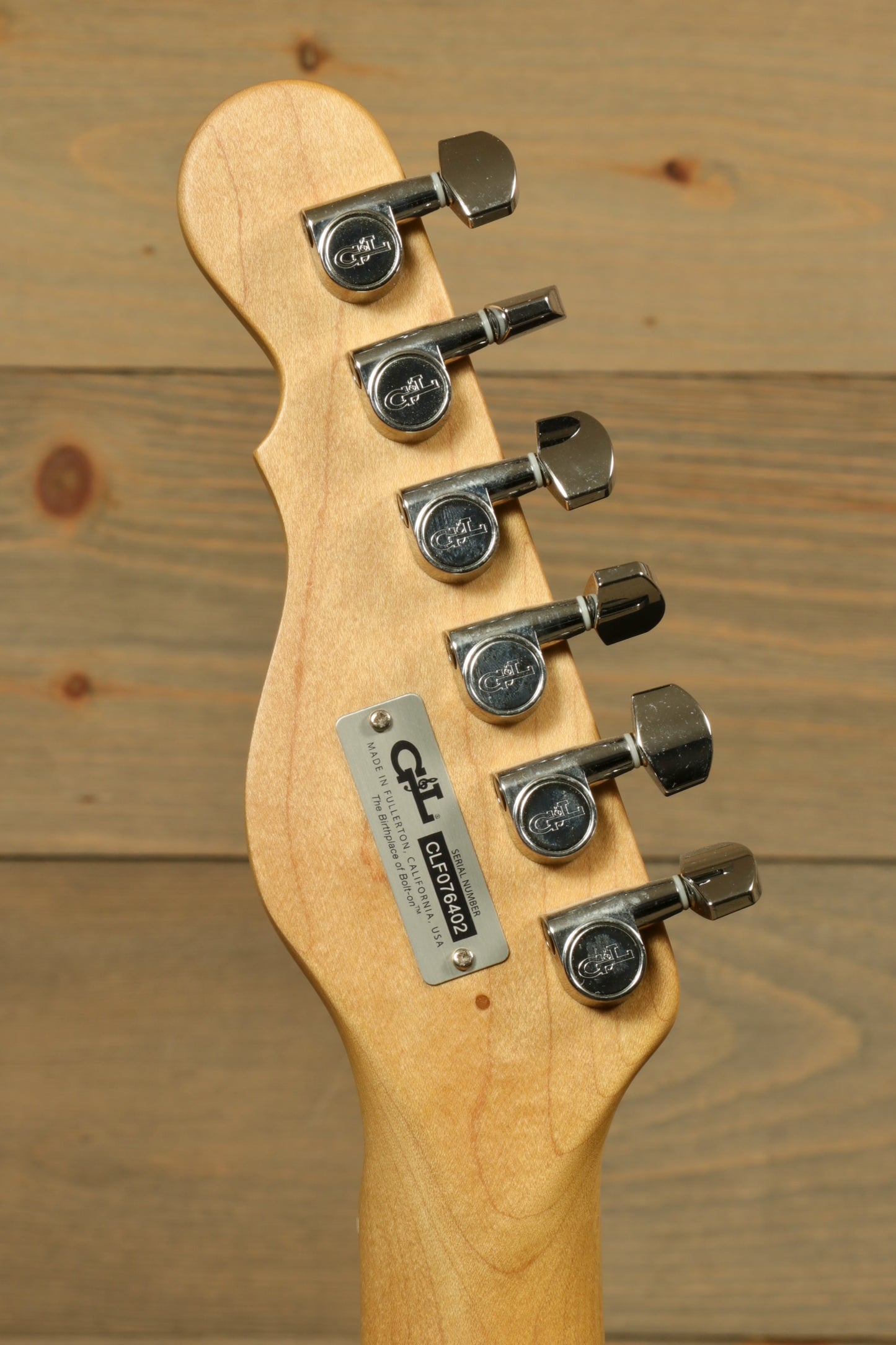 G&L 2016 ASAT Classic electric guitar headstock, natural wood finish with six tuning pegs