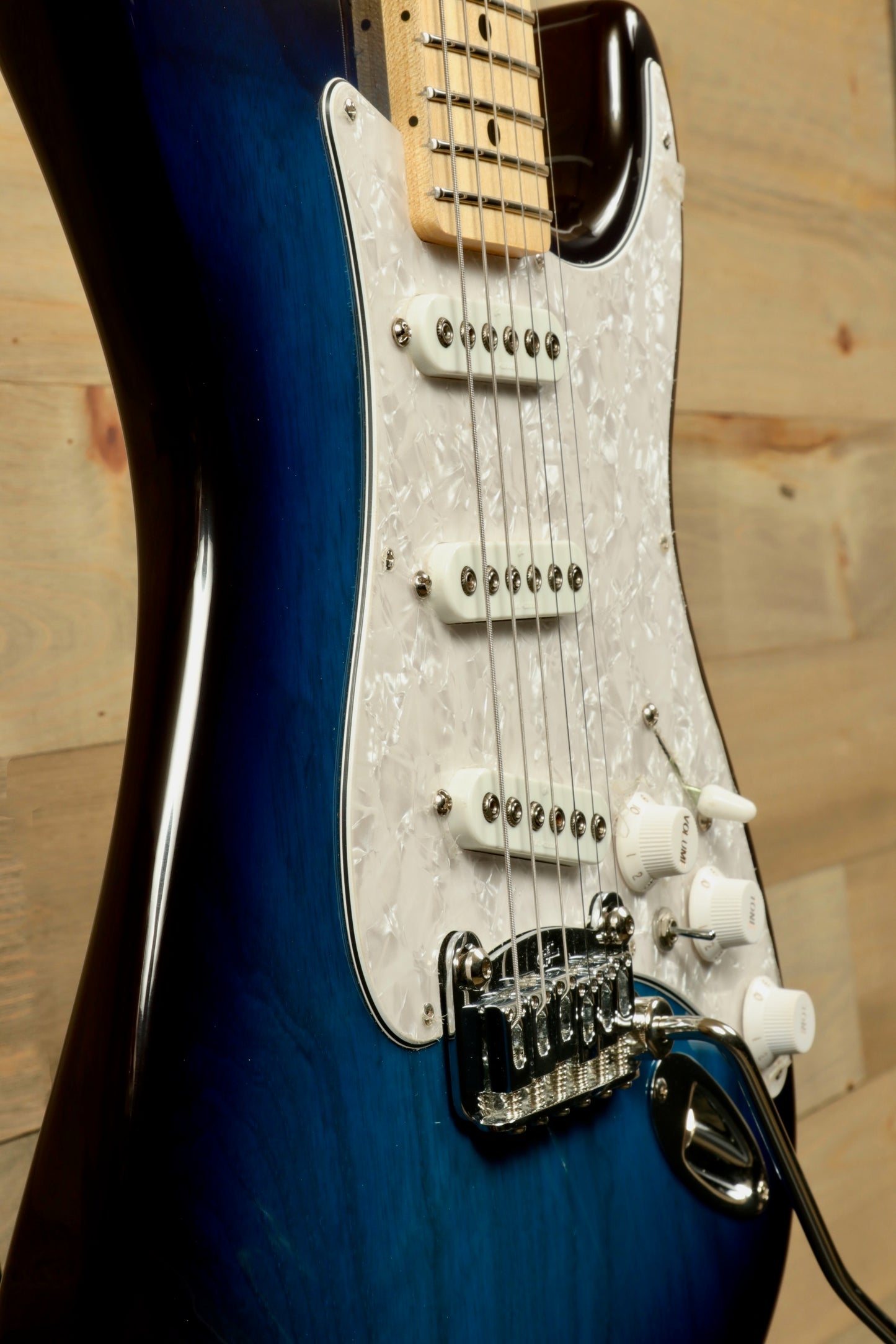 G&L S-500 Electric Guitar in blue burst finish, side view highlighting hardware and body shape