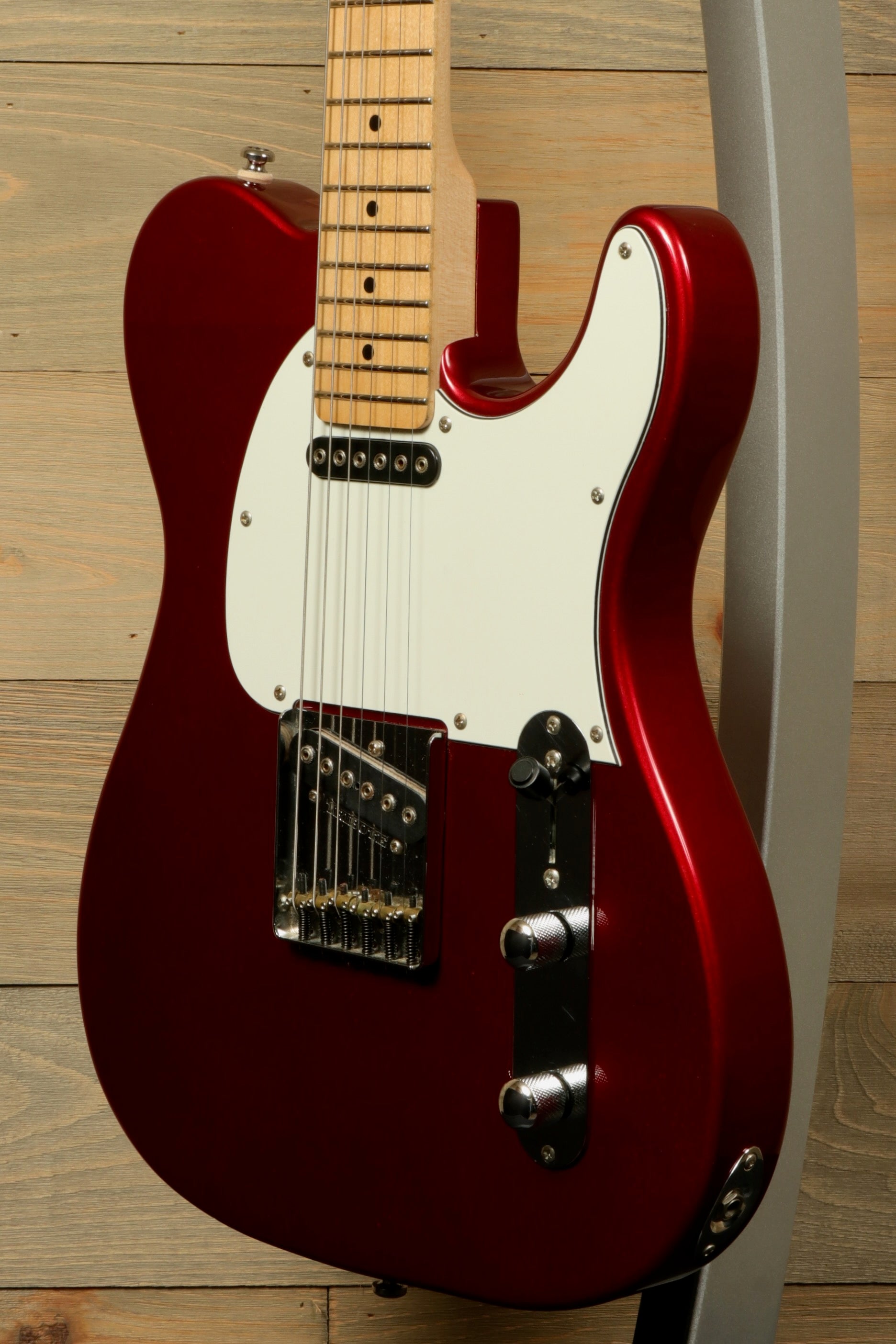 G&L Tribute ASAT Classic with G&L Gig Bag in red, featuring a sleek design and solid build