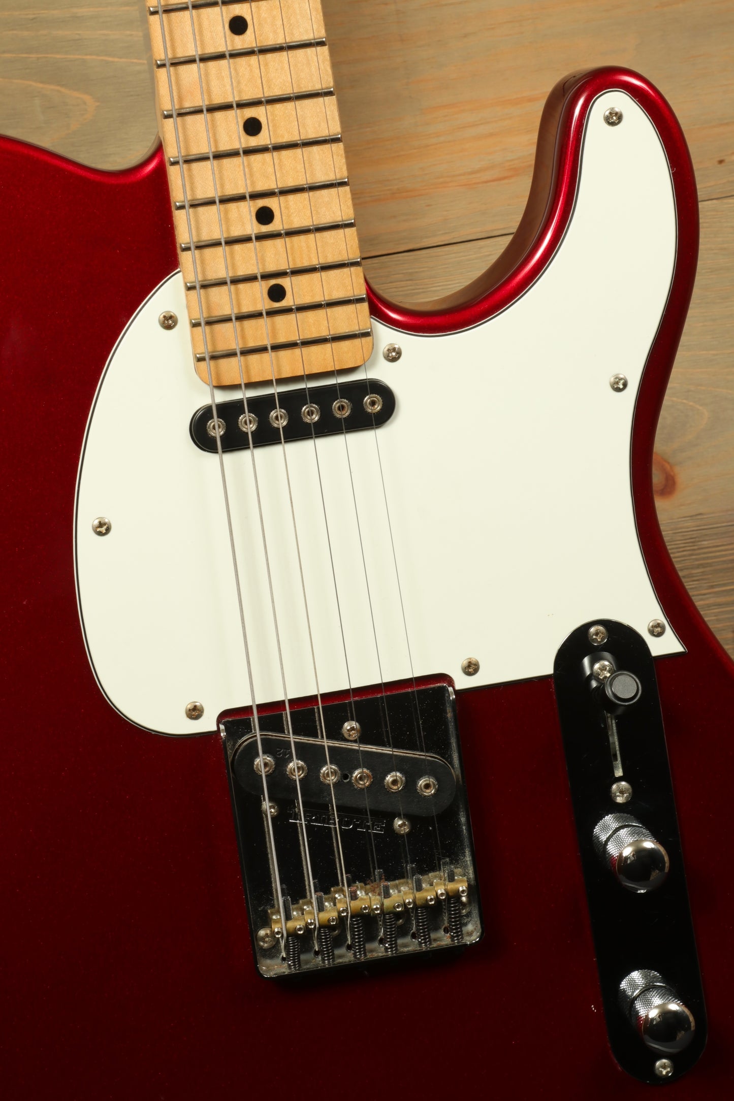 G&L Tribute ASAT Classic with G&L Gig Bag showcasing a vibrant red electric guitar body and maple neck