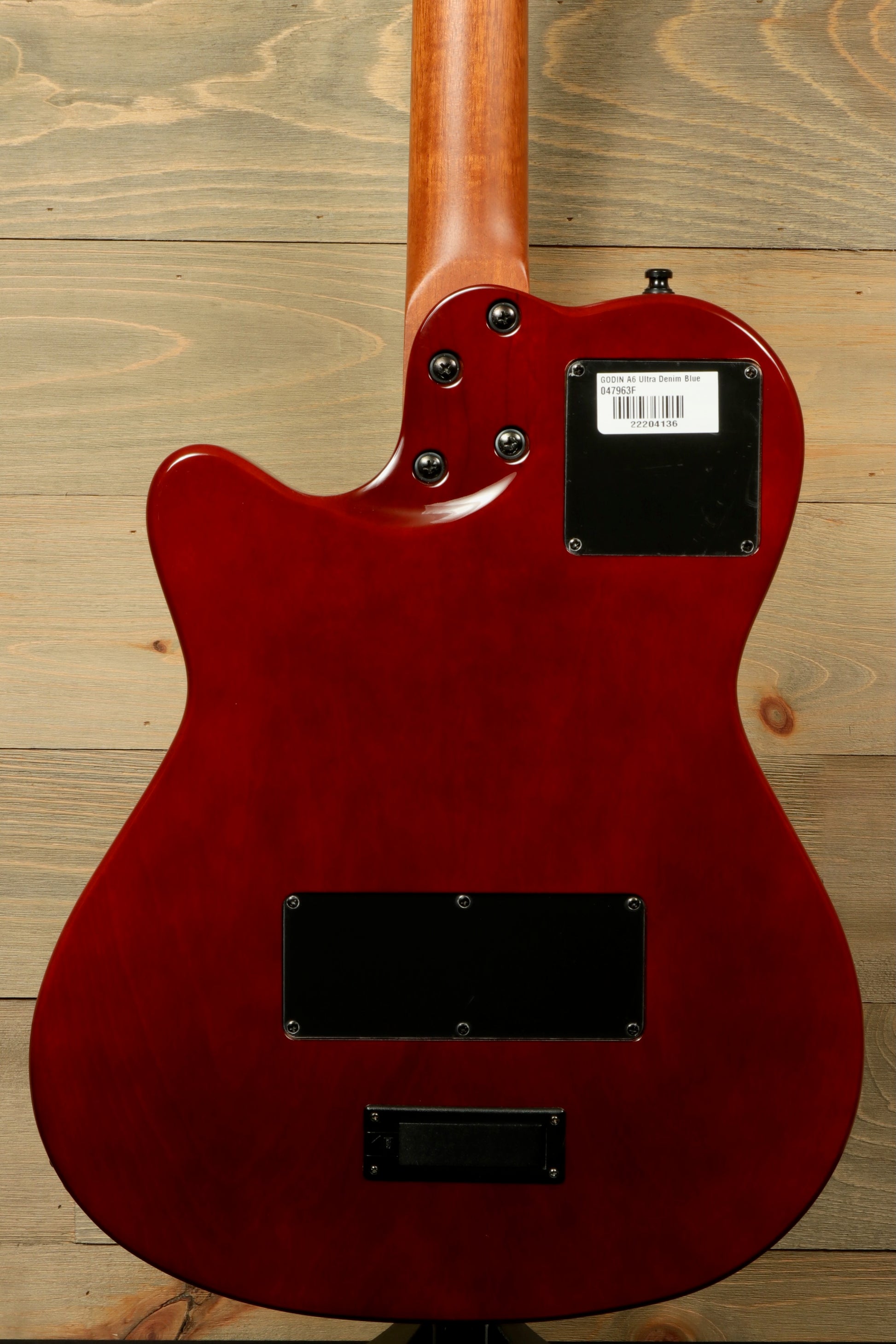 Back view of Godin A6 Ultra Denim Blue Flame guitar showcasing its smooth finish with gig bag included