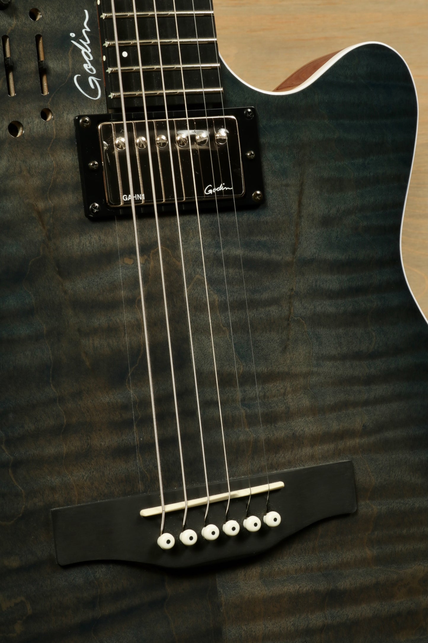 Godin A6 Ultra Denim Blue Flame Acoustic Electric Guitar with Gig Bag showcasing unique finish and quality craftsmanship