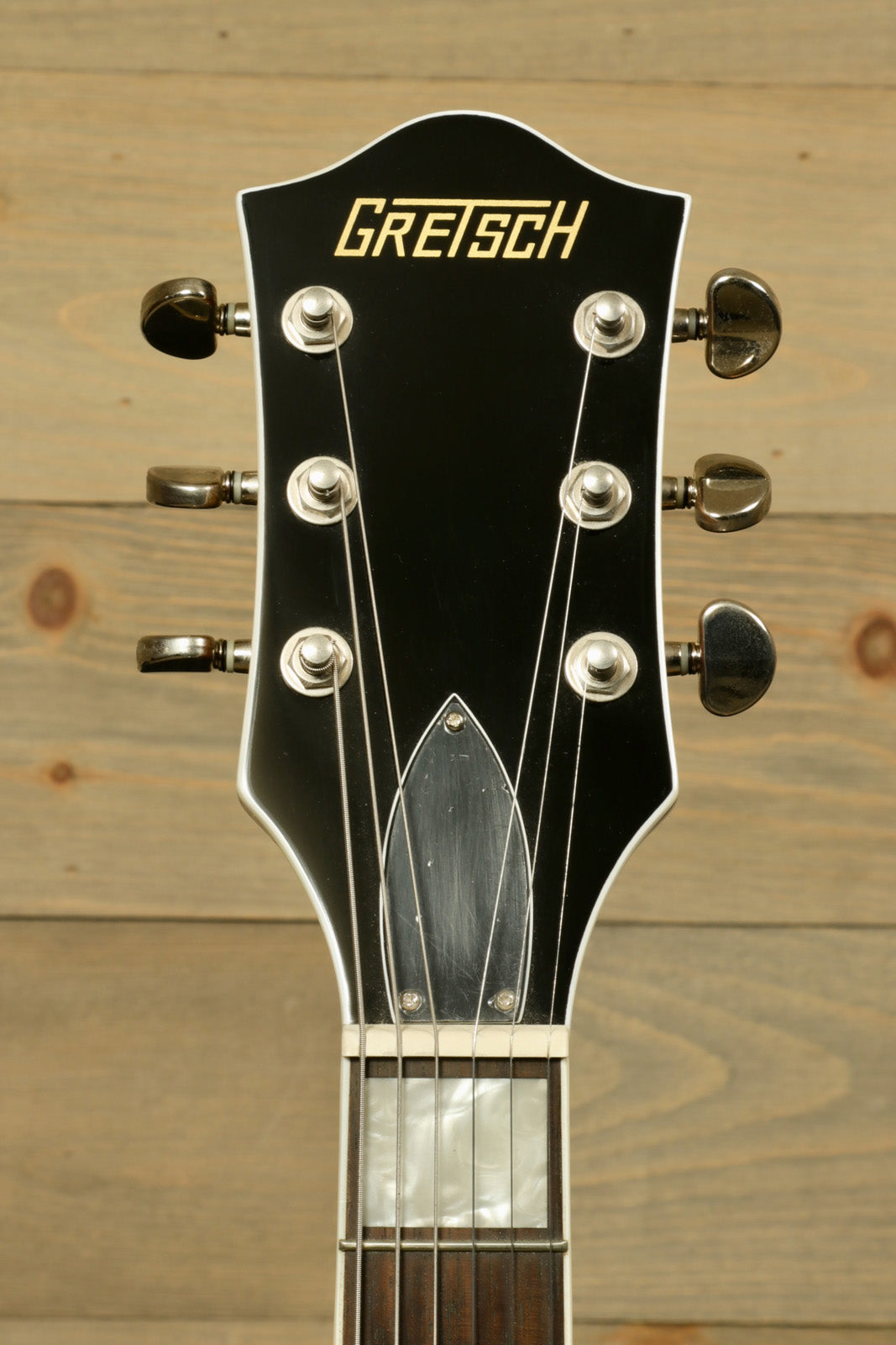 Gretsch G2420ABB with Hardshell Case (USED) showcasing the headstock and tuning pegs for musicians