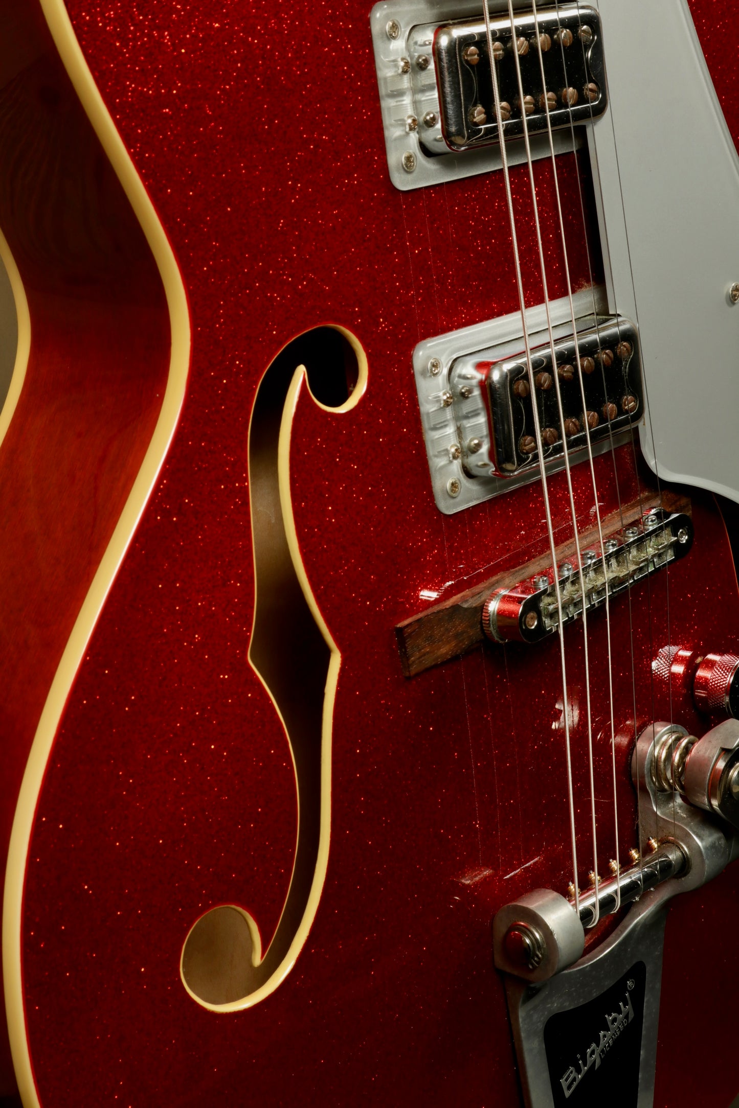 Gretsch G5420T Korea hollow body electric guitar in red glitter finish, close-up view
