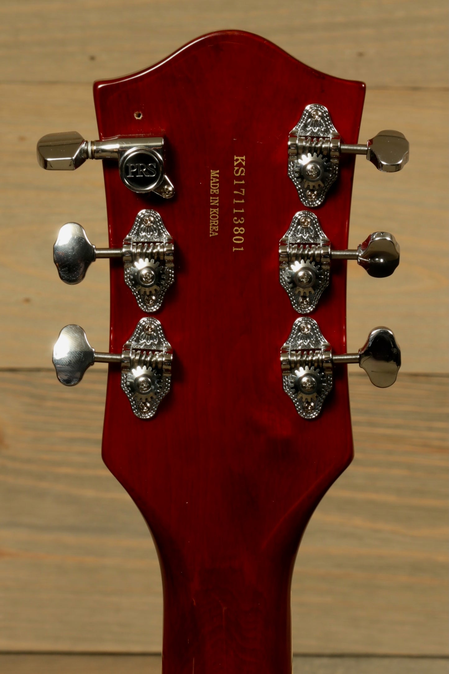 Gretsch G5420T Korea electric guitar in cherry finish, back view showing tuning pegs and neck details