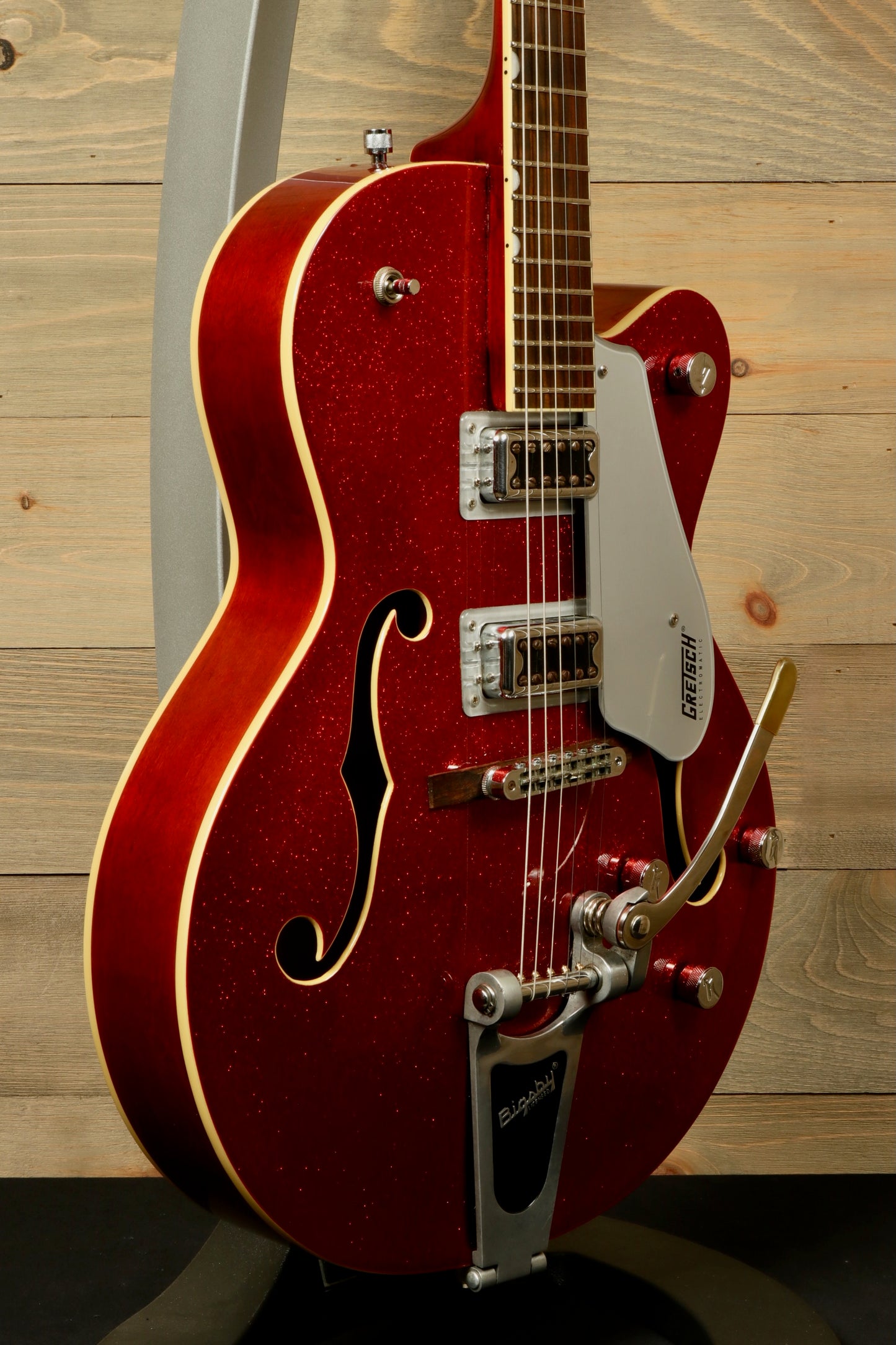 Gretsch G5420T Korea hollow body electric guitar in sparkling red, side view