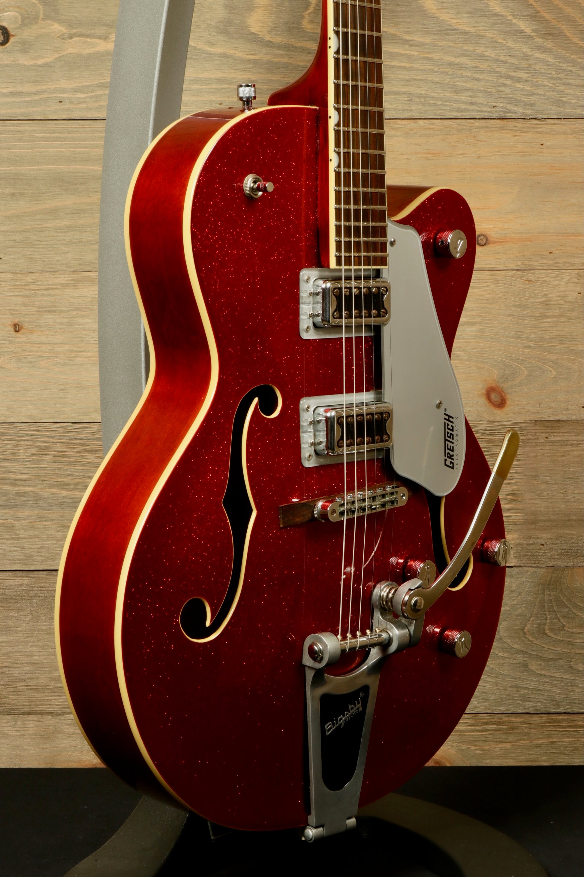 Gretsch G5420T Korea hollow body electric guitar in sparkling red, side view