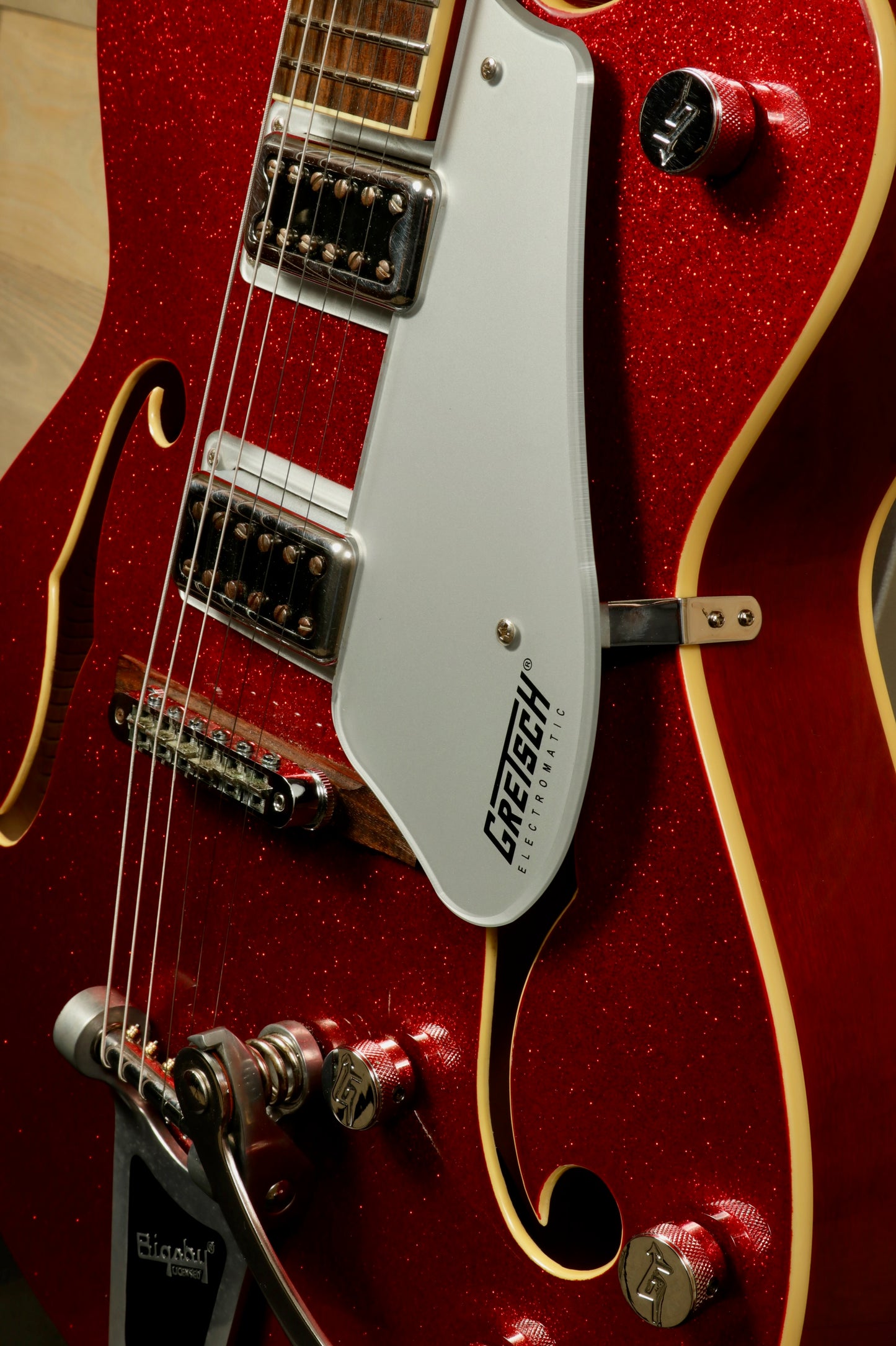 Gretsch G5420T Korea hollow body electric guitar in sparkling red, close-up view