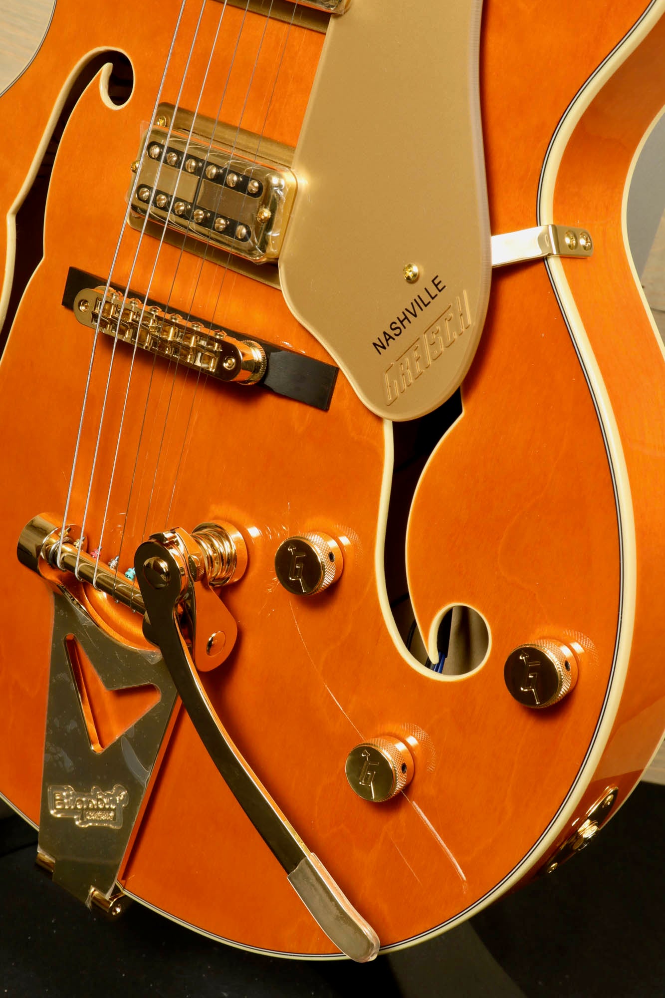 Gretsch Synchromatic Nashville hollow body guitar in orange with chrome hardware and classic styling