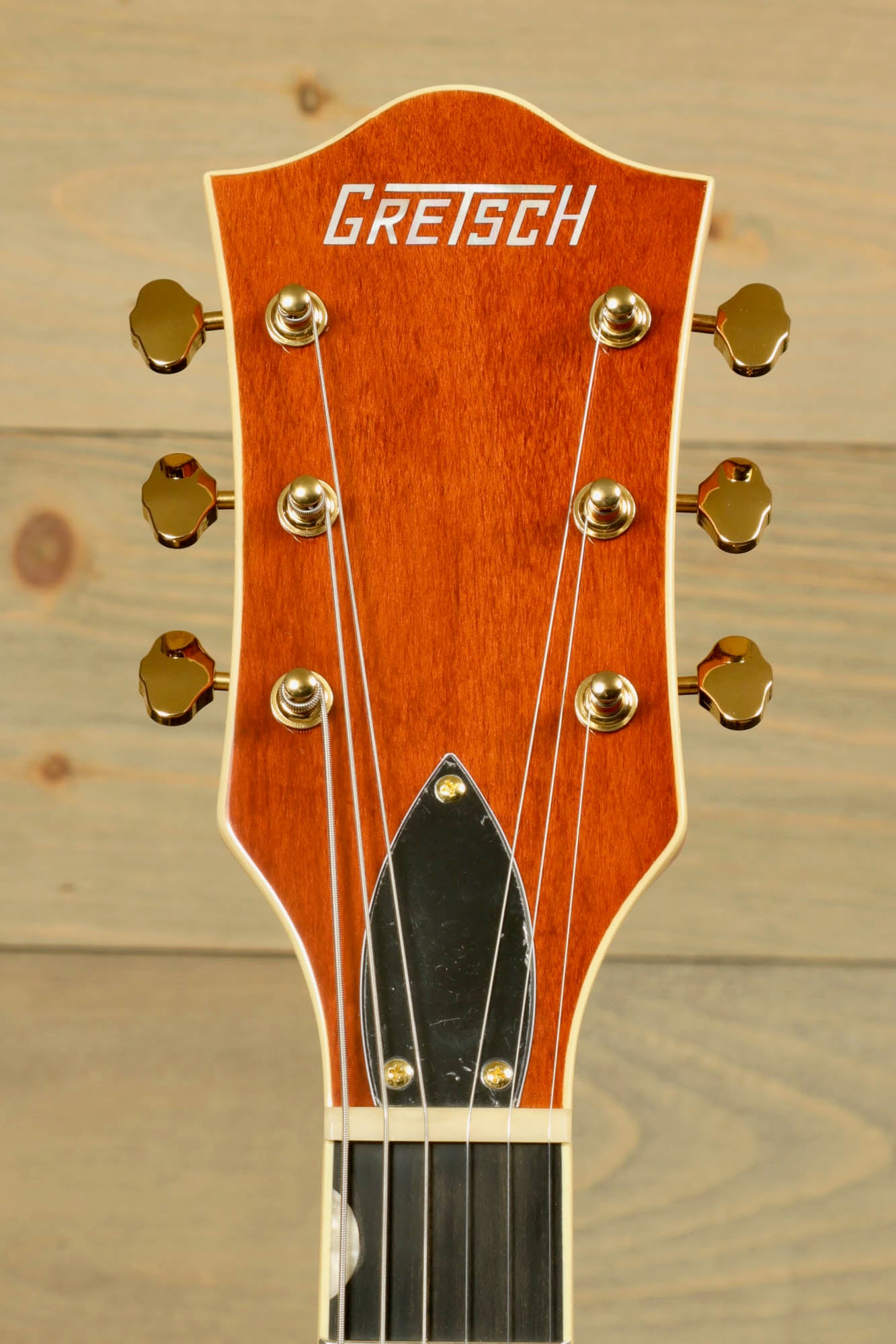 Gretsch Synchromatic Nashville hollow body guitar headstock with vintage design and gold tuning pegs