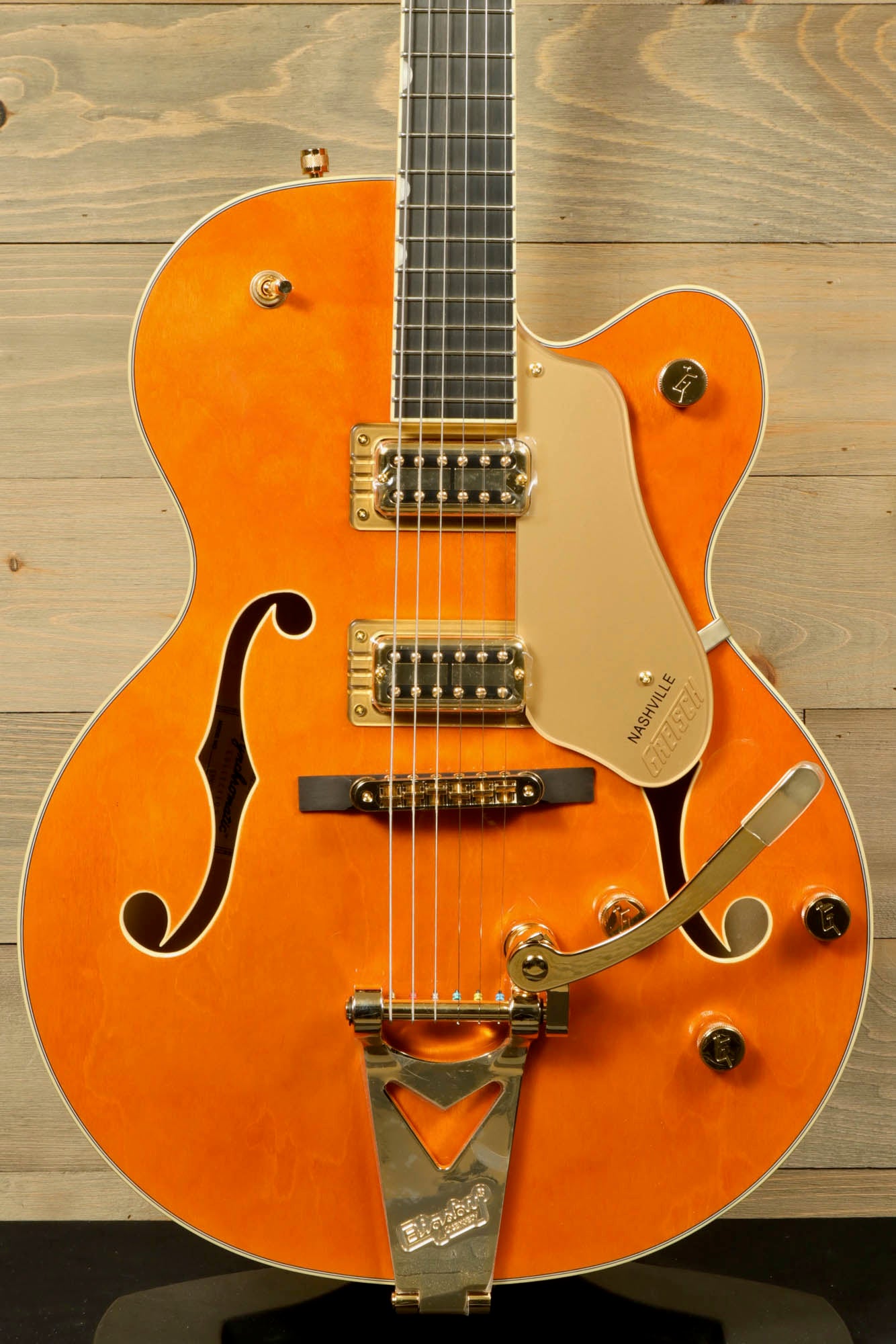 Gretsch Synchromatic Nashville hollow body guitar in bright orange with gold hardware and classic design