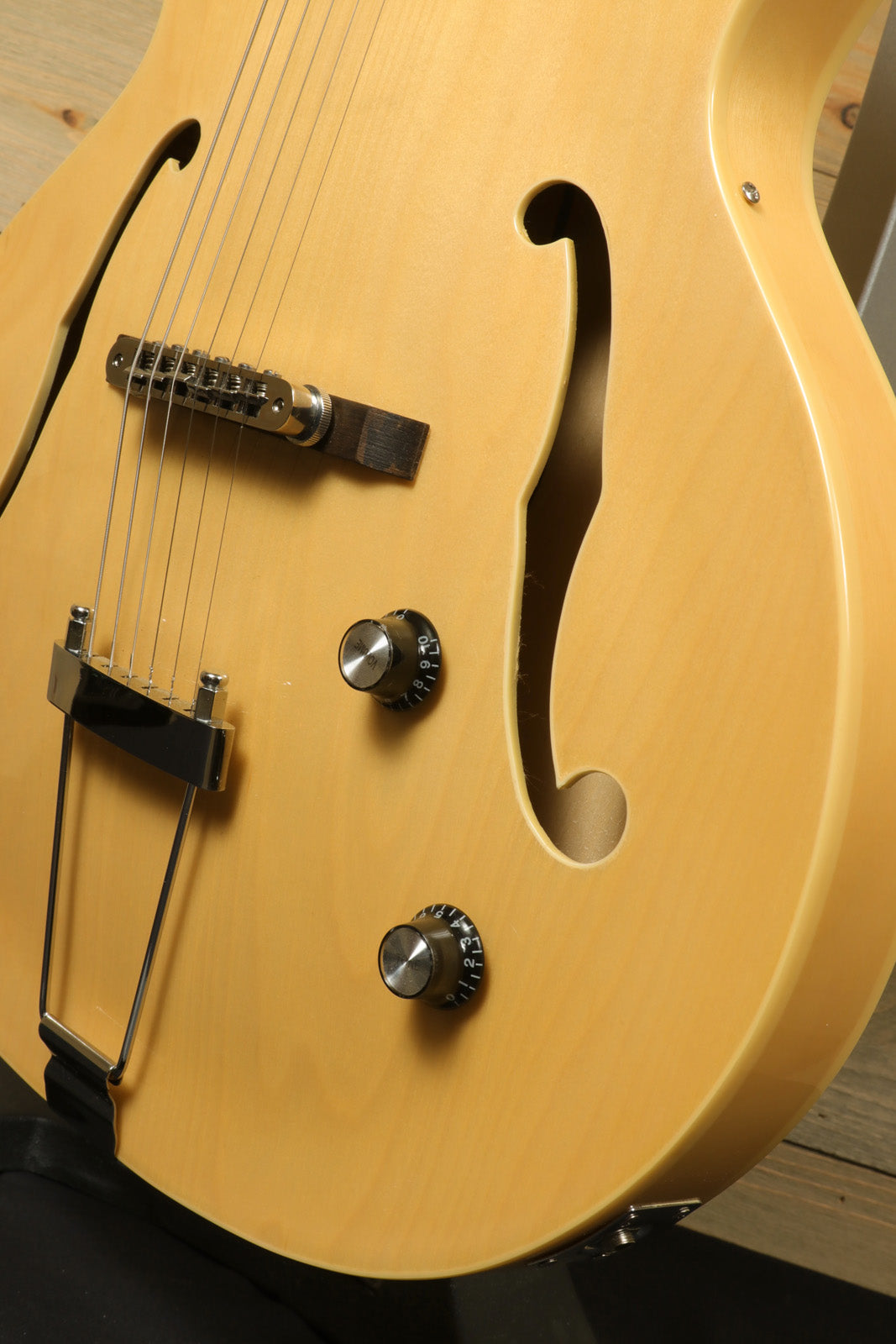 Grote Guitar Natural Hollow Body Jazz Electric Guitar, front view with f-holes and control knobs