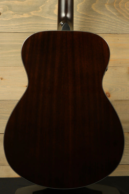 Yamaha acoustic electric guitar, dark wood finish, back view showcasing smooth contours