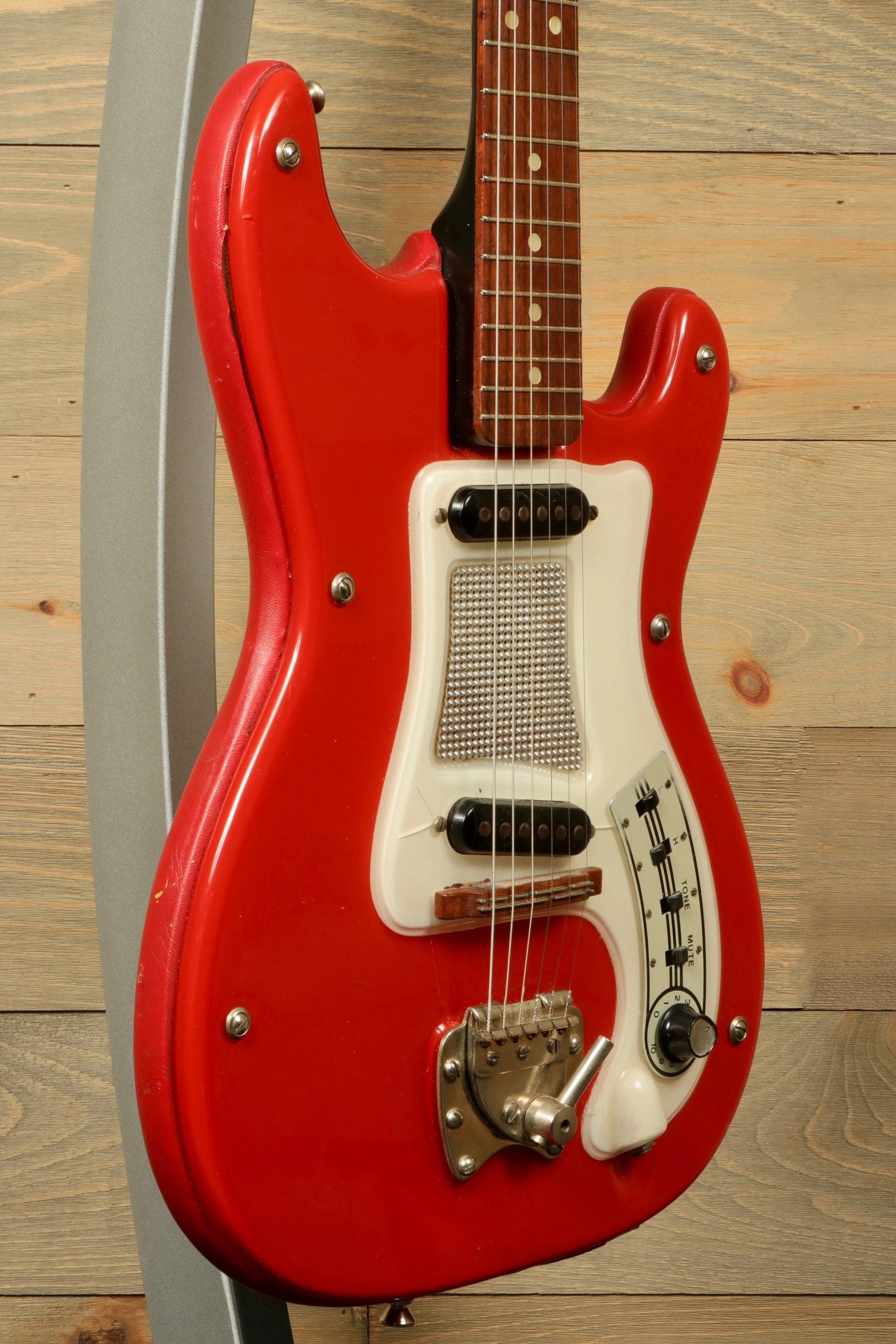 Hagstrom Vintage I electric guitar in red with vintage design, front view with gig bag