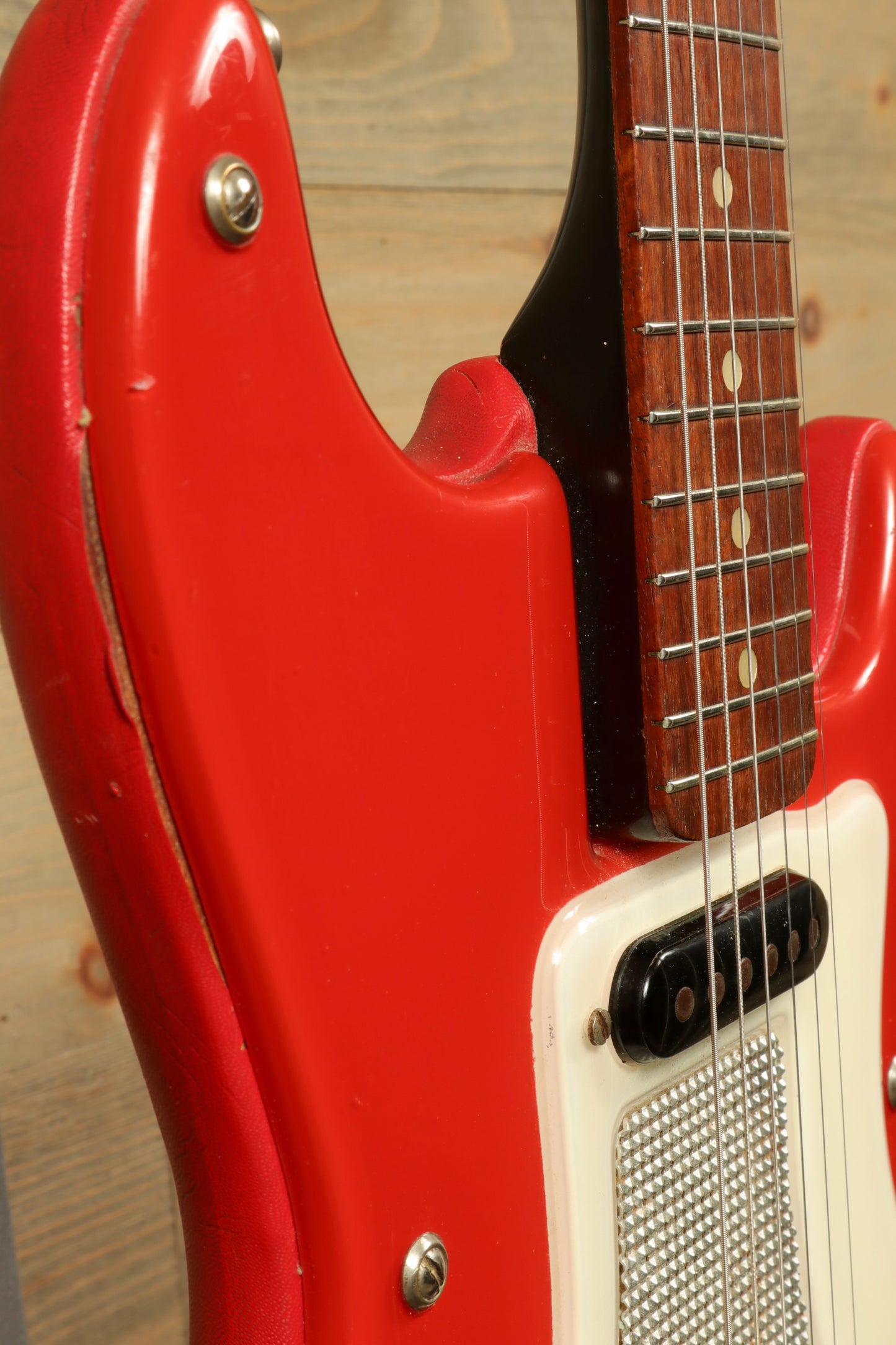 Hagstrom Vintage Hagstrom I in bright red with textured finish, angled view showcasing the body and neck