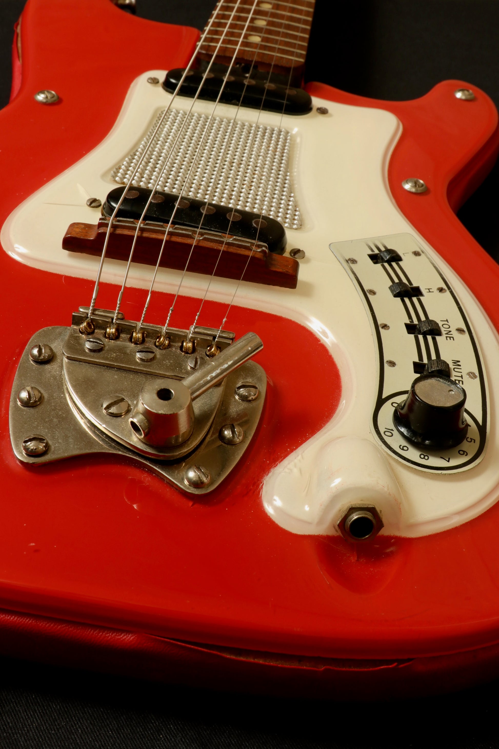 Hagstrom Vintage I electric guitar in red with chrome hardware, top view, includes gig bag