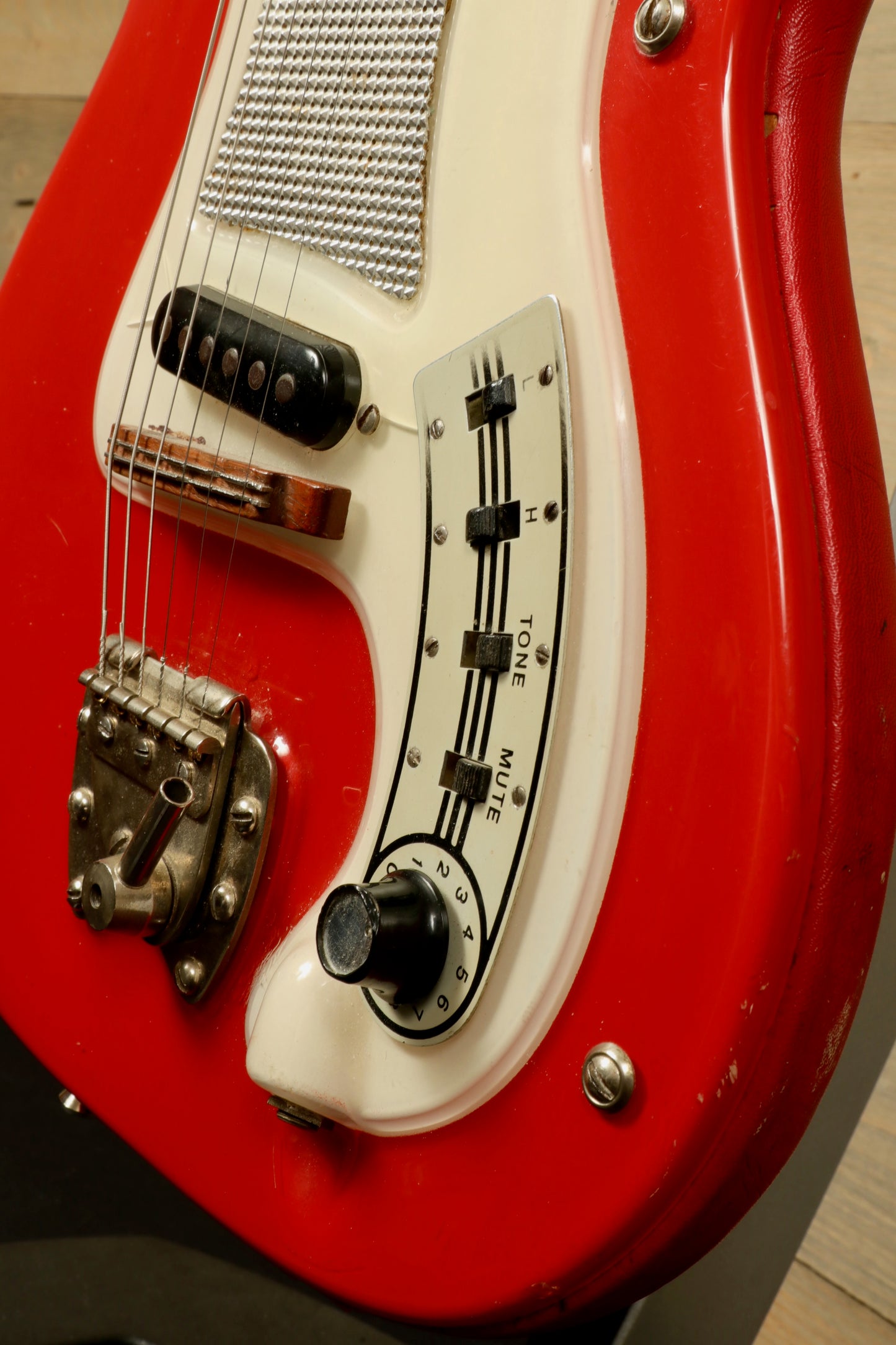 Hagstrom Vintage I electric guitar in red with controls and gig bag, side view