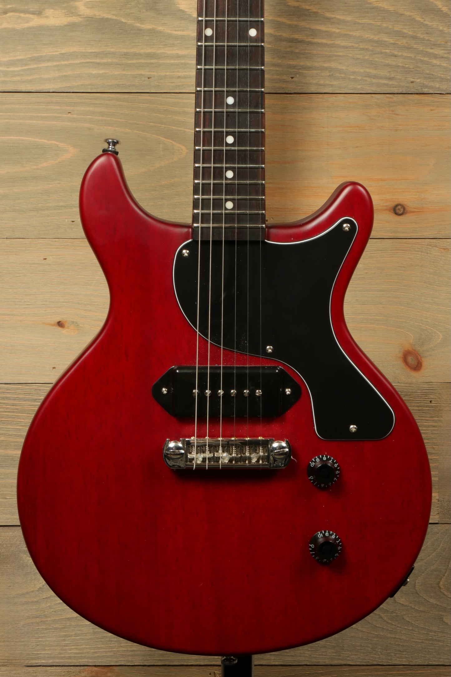 Harley Benton DC-Jr Faded Cherry used electric guitar, front view with black pickguard