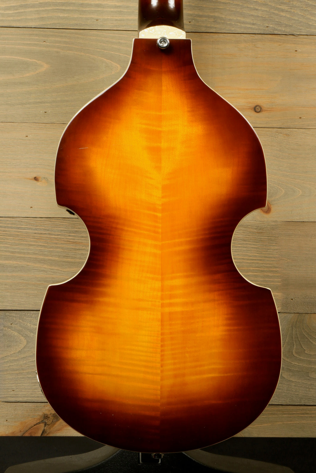 Hofner Guitar hollow body, sunburst finish, back view showcasing the beautiful wood grain