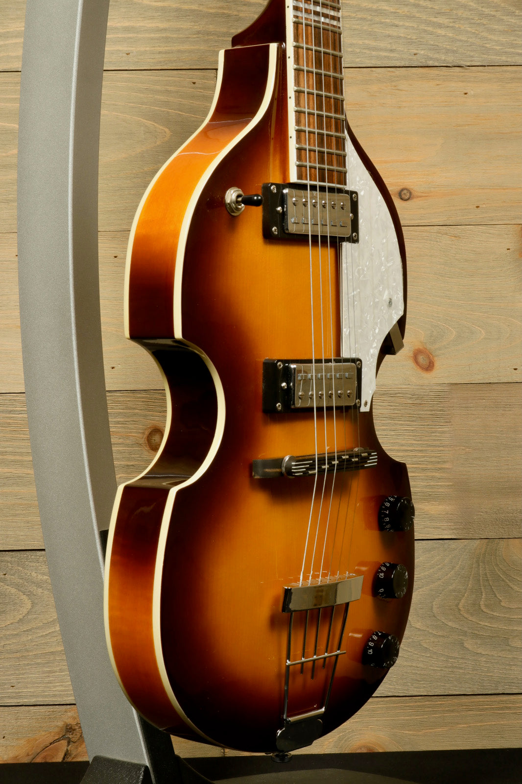 Hofner Guitar sunburst hollow body electric guitar, side view showcasing its elegant design