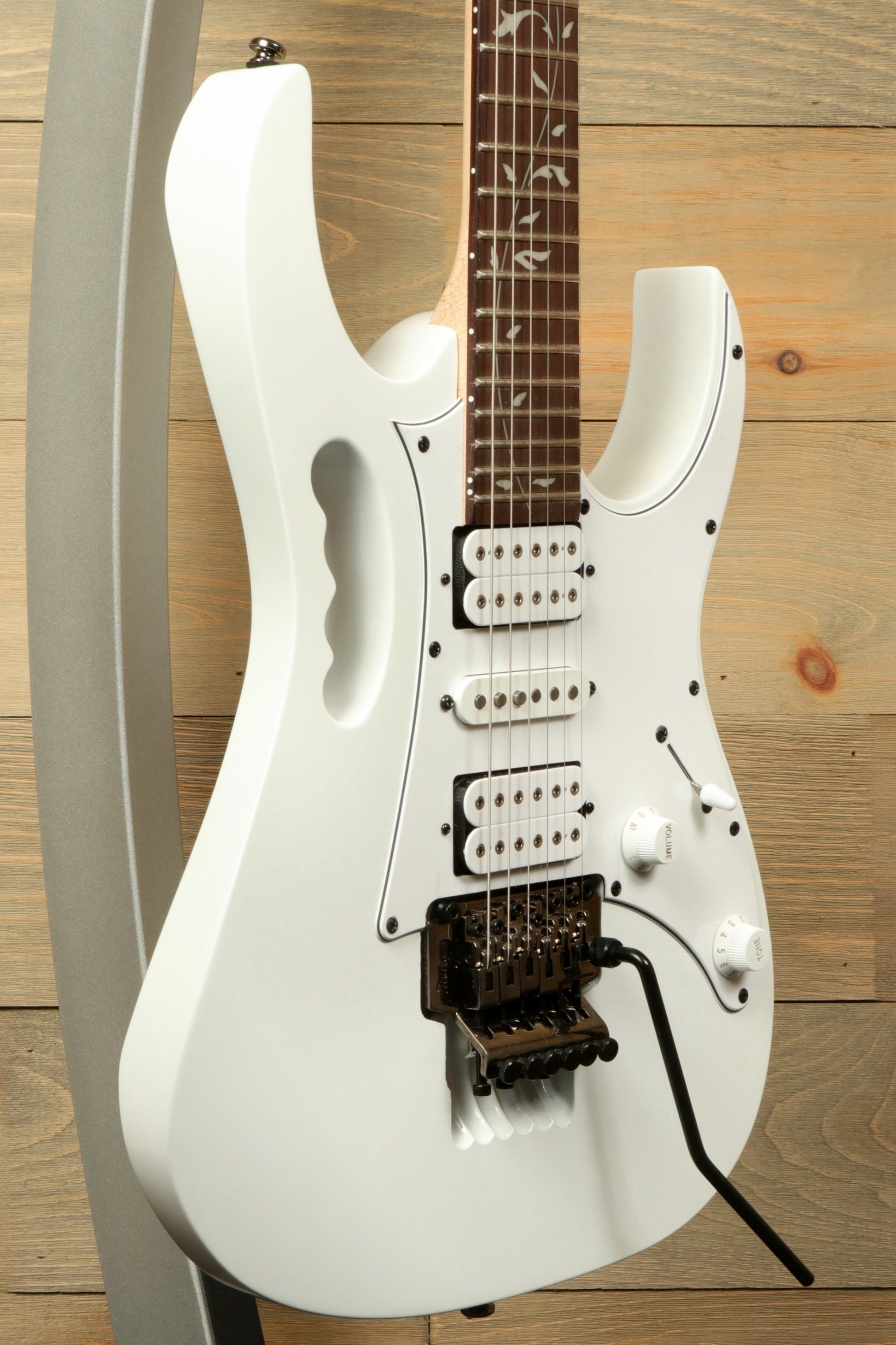 Ibanez JEMJR Steve Vai white electric guitar, side view with double cutaway design
