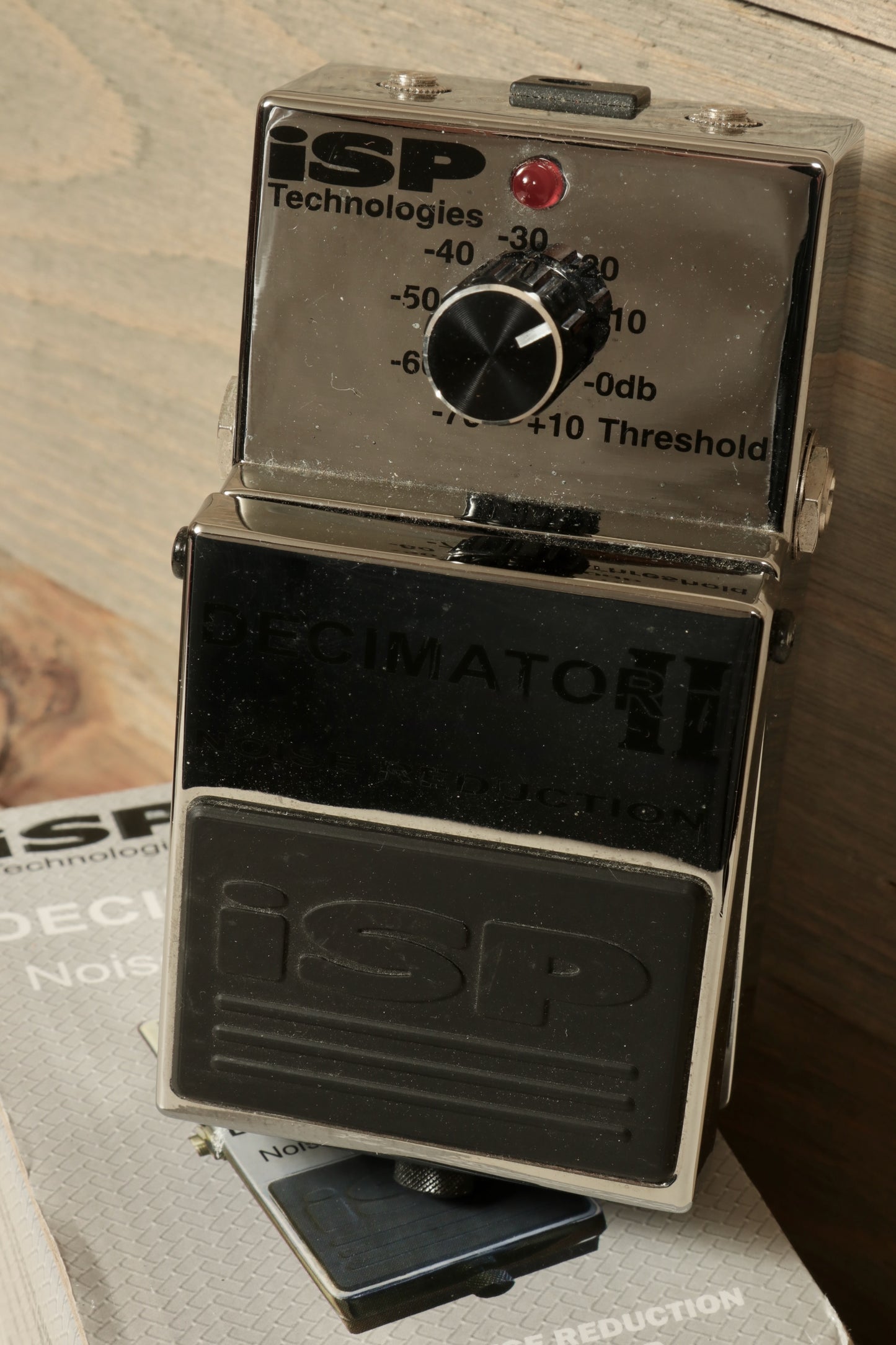 Used ISP Decimator II noise reduction pedal in silver with control knobs and footswitch for guitar effects