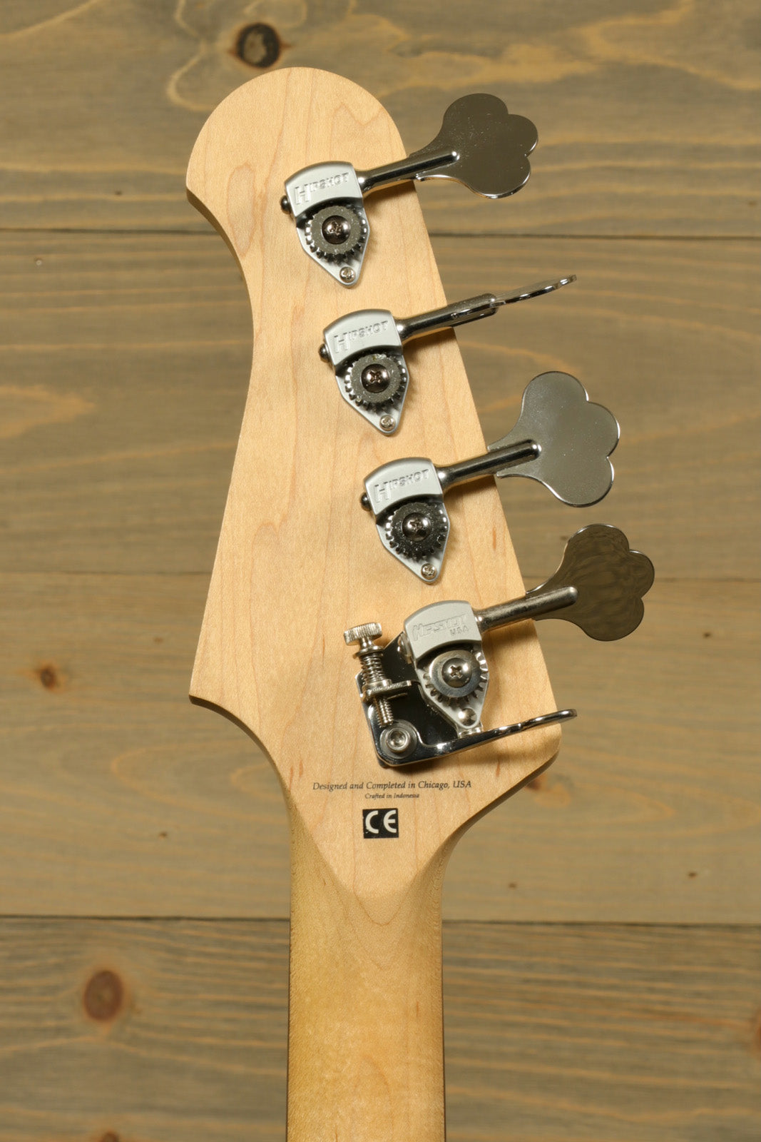 Lakland Skyline 44-01 bass guitar headstock, natural finish with chrome tuning pegs, rear view