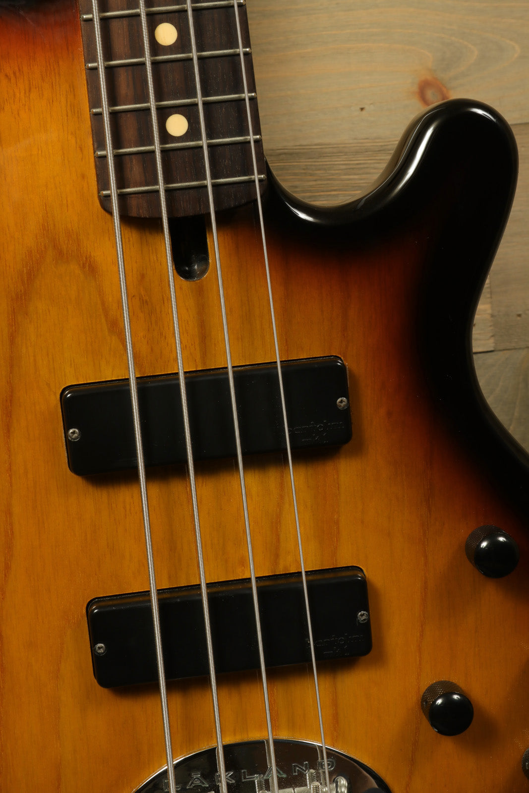 Lakland Skyline 44-01 bass guitar in sunburst finish, top view showing pickups and fretboard details