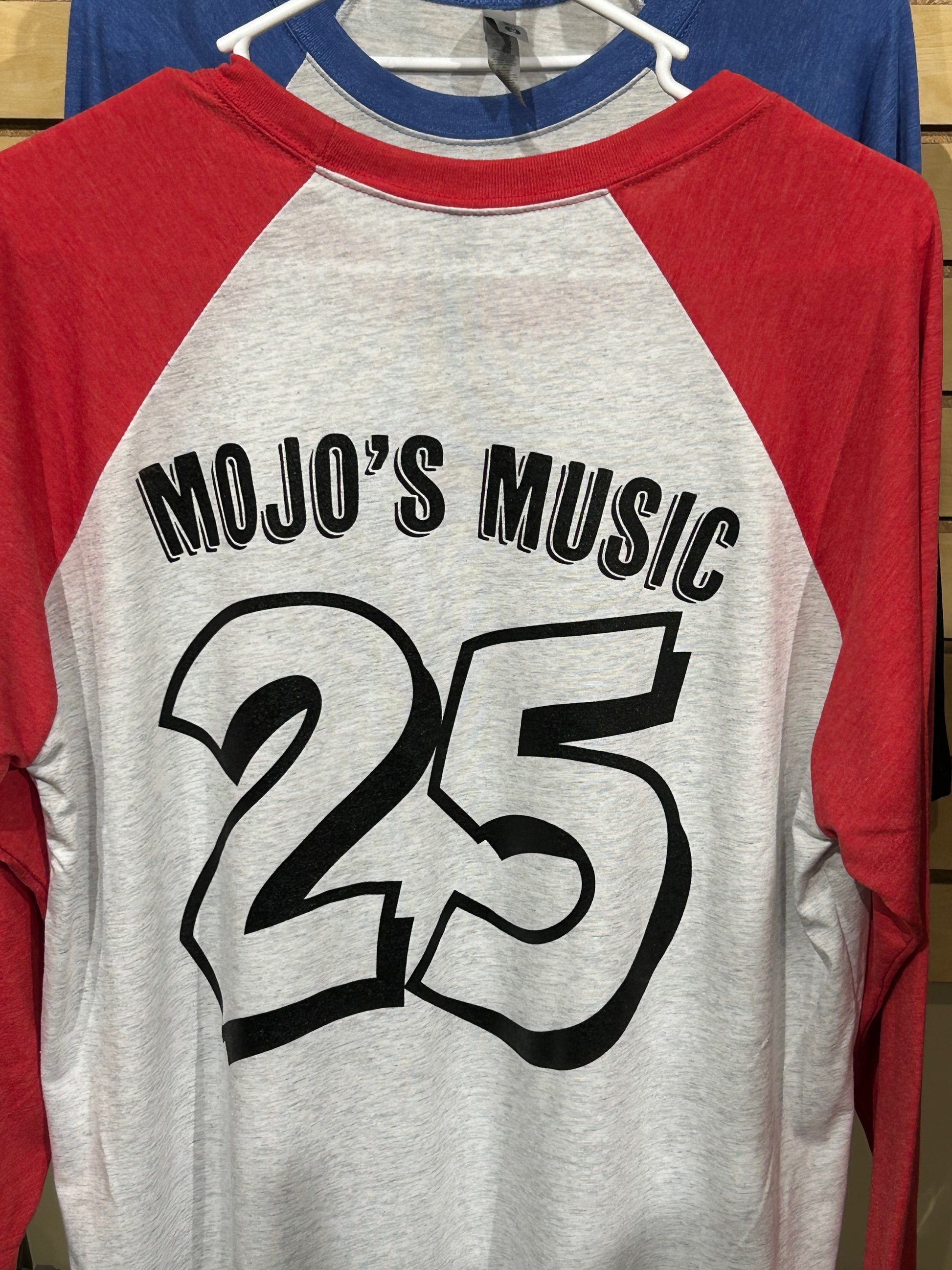 Mojo's Music 25th anniversary baseball tee with red sleeves and 25 on the back