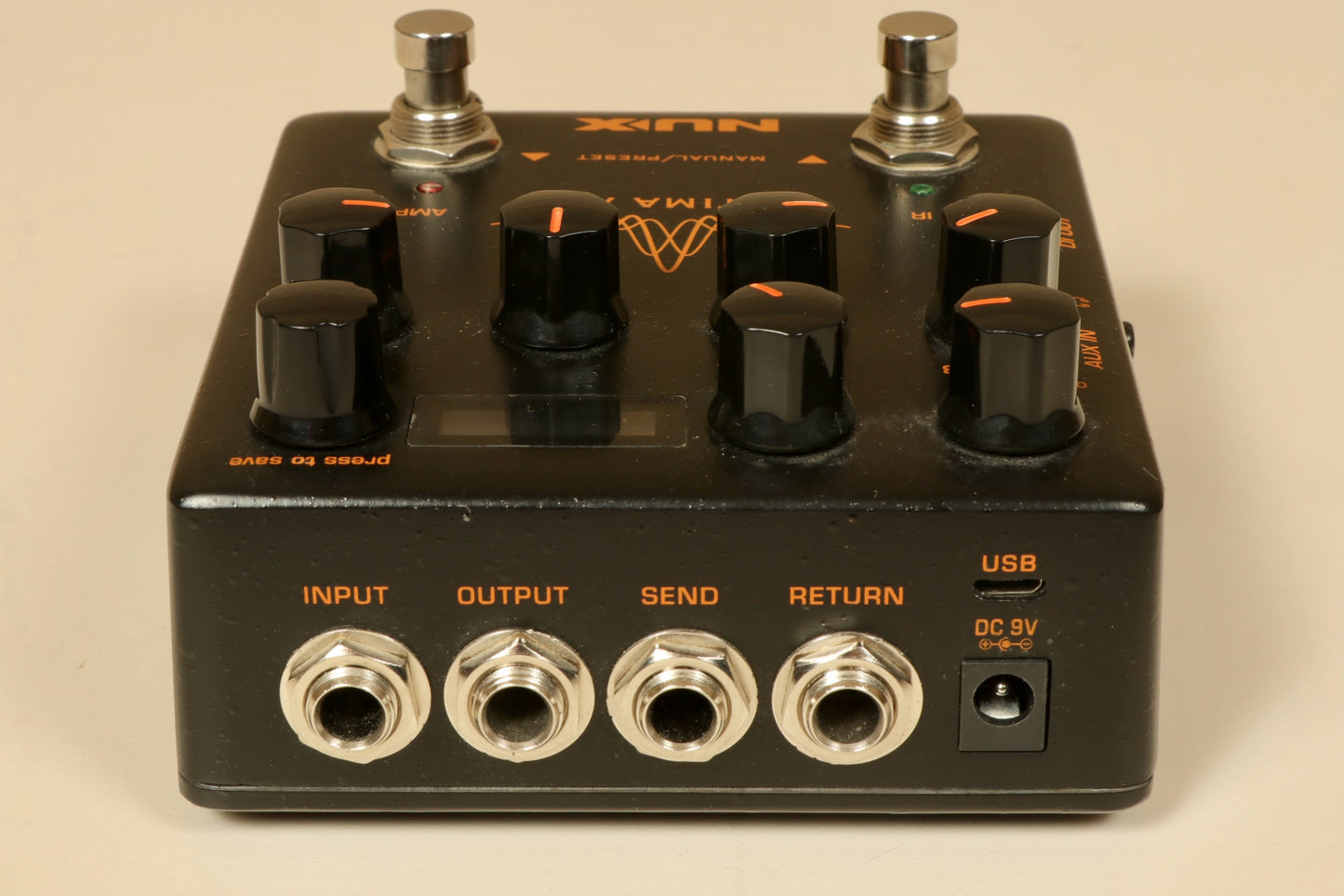 NU-X Optima Air Acoustic Simulator and IR Loader in black, top view with knobs and input/output ports