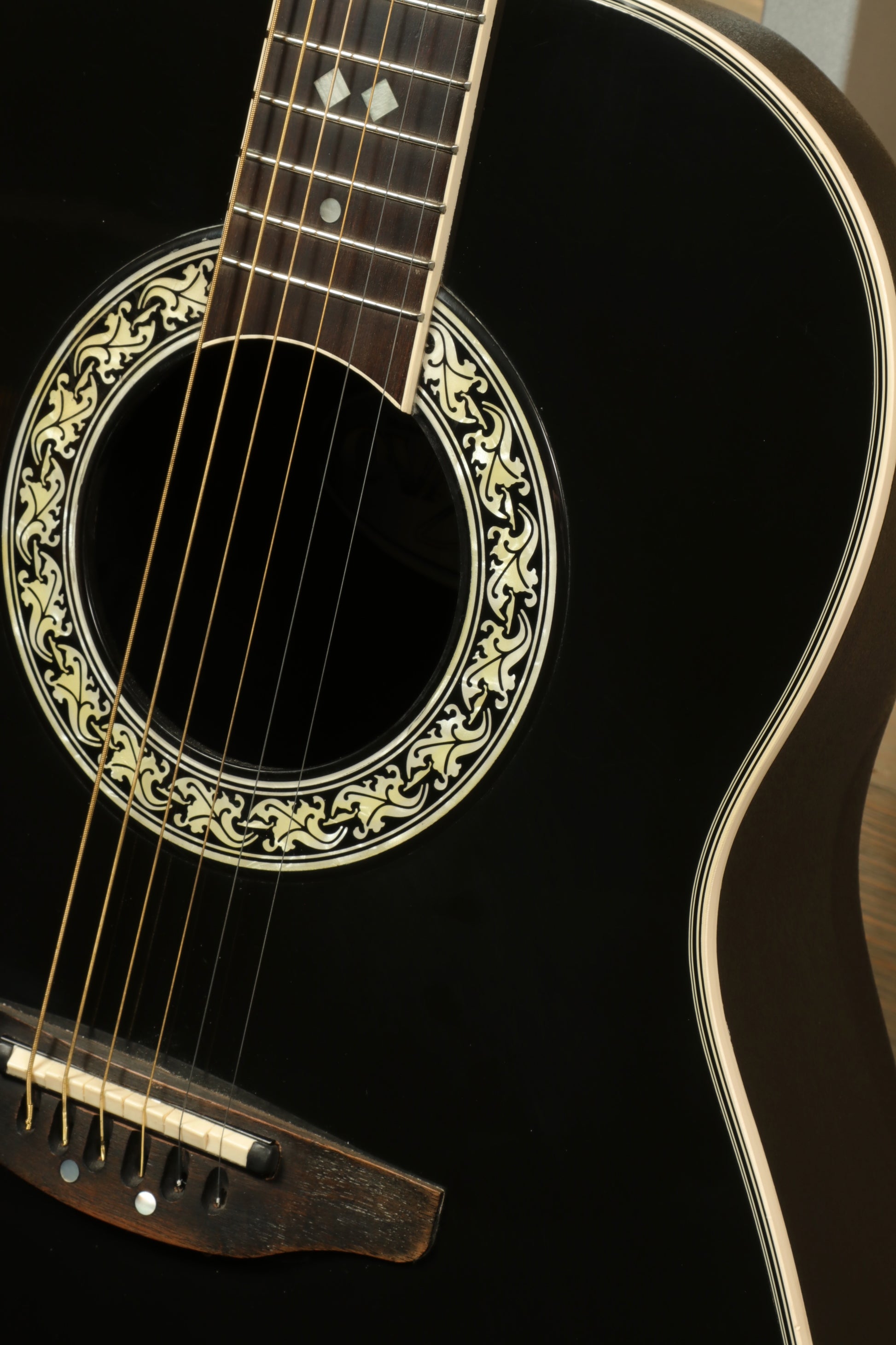 Ovation 1617 Legend with Original Hardshell Case showcasing intricate inlays and black finish