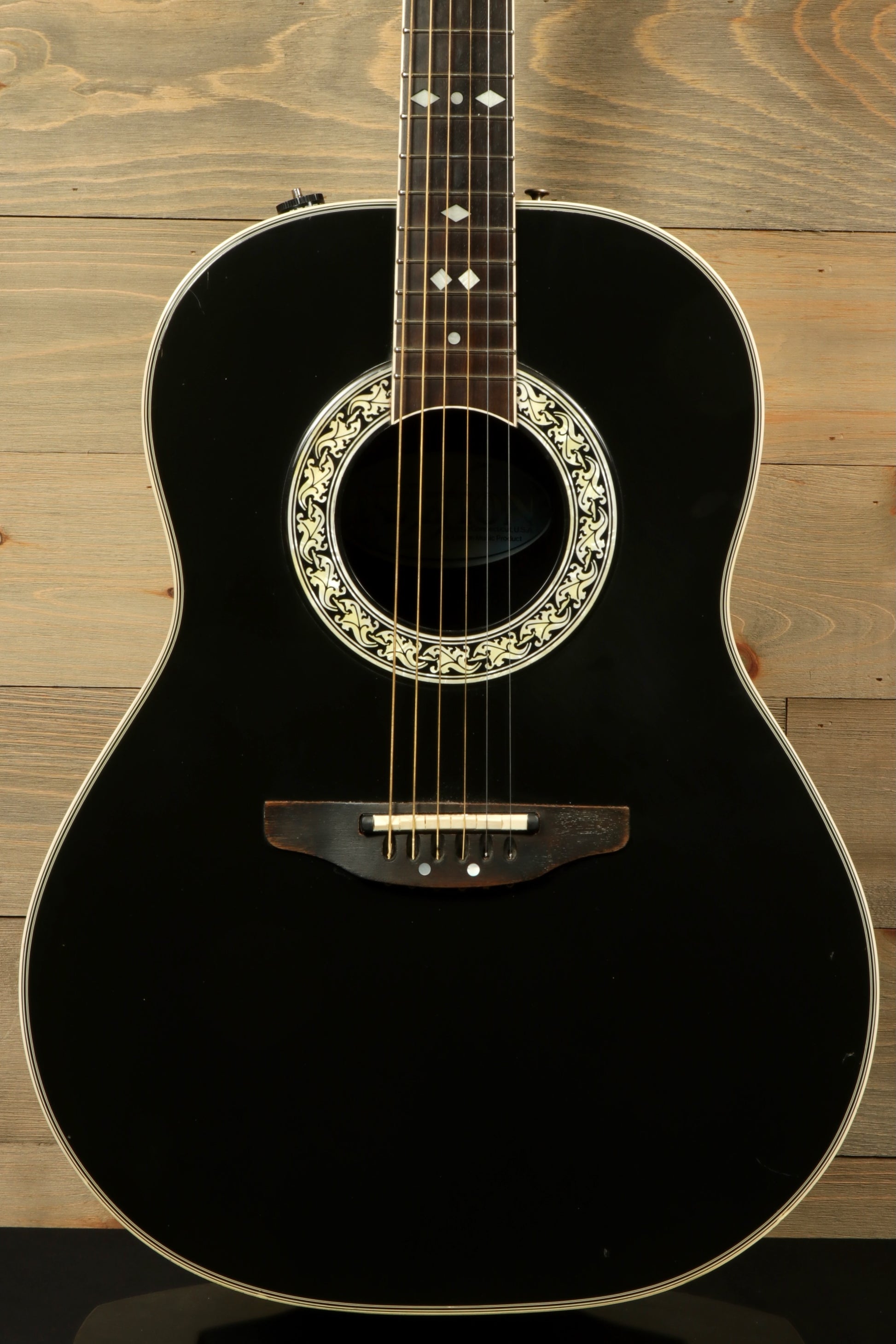 Ovation 1617 Legend with Original Hardshell Case featuring a sleek black finish and ornate inlays