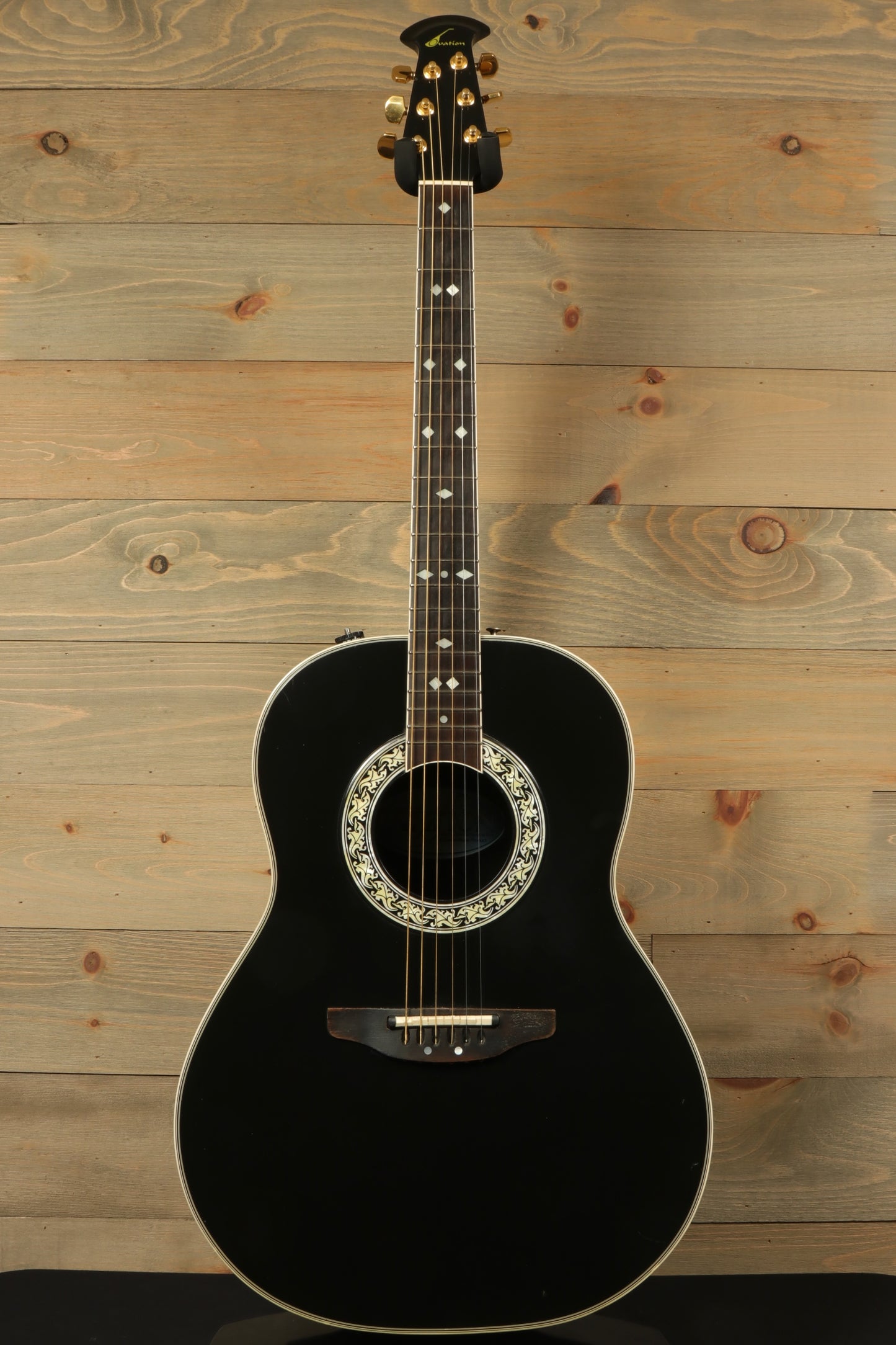 Ovation 1617 Legend Acoustic Electric Guitar with Original Hardshell Case, featuring a sleek black finish
