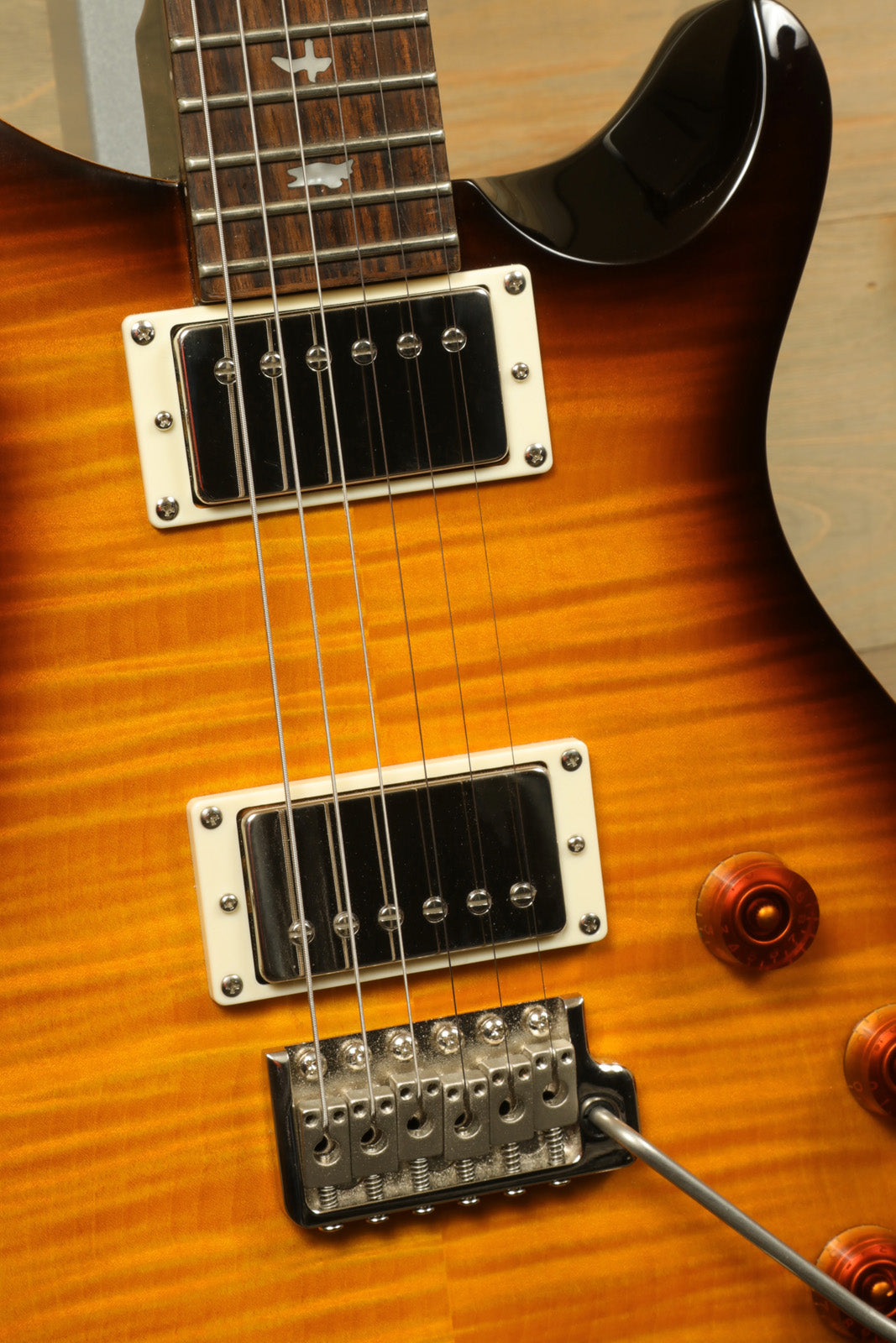 Paul Reed Smith SE DGT Sunburst Electric Guitar with PRS Gig Bag showcasing its stunning finish and pickups