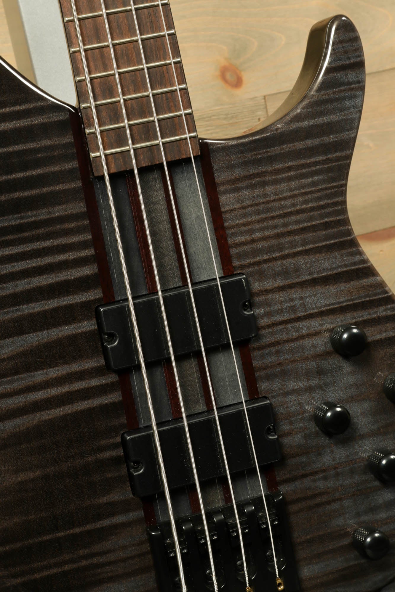 Close-up of the Peavey Cirrus 4 bass guitar showcasing the frets and body design