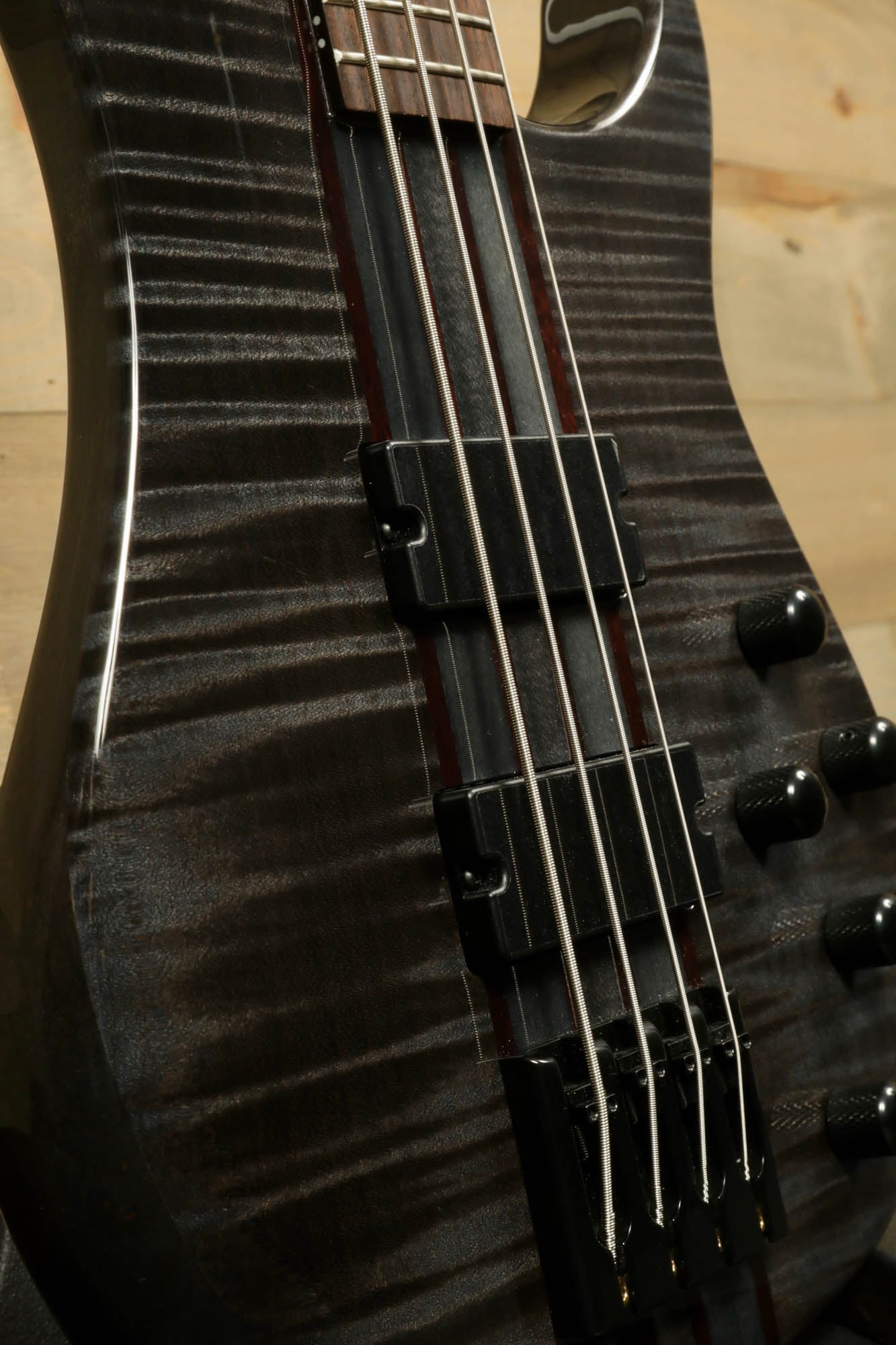 Close-up of Peavey Cirrus 4 bass guitar showcasing its sleek design and fine details