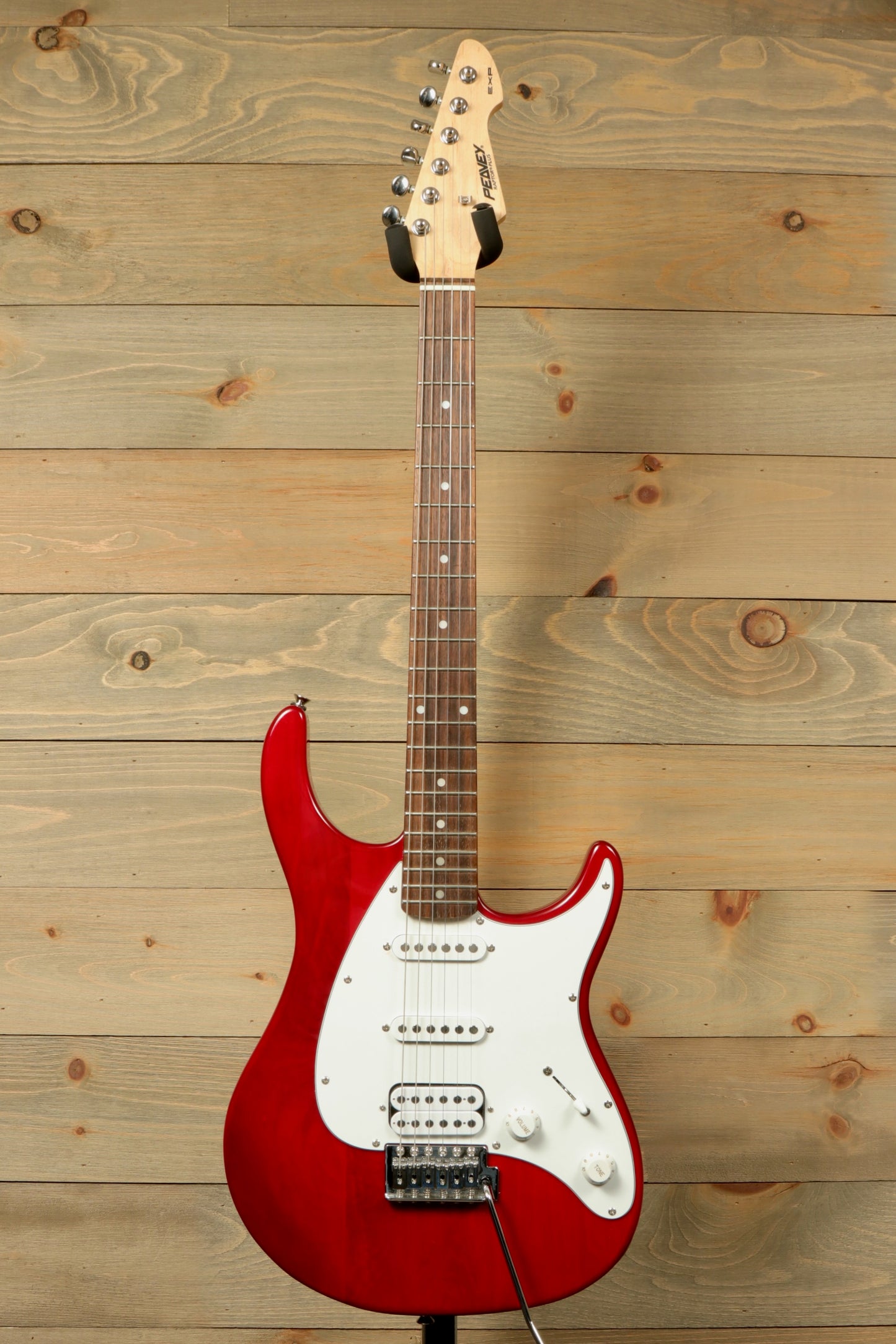 Peavey Raptor Plus - USED electric guitar in red with a sleek design and versatile sound