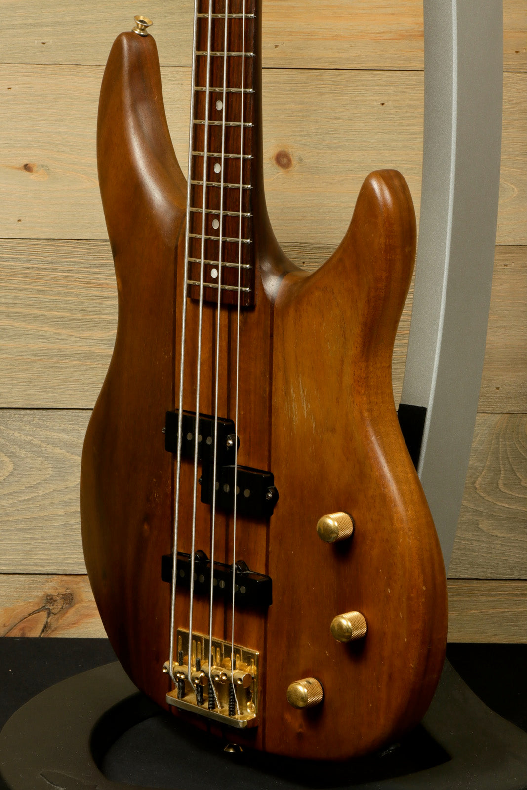 Peavey Vintage Peavey Unity Koa Bass in natural wood finish, front view showcasing body and hardware