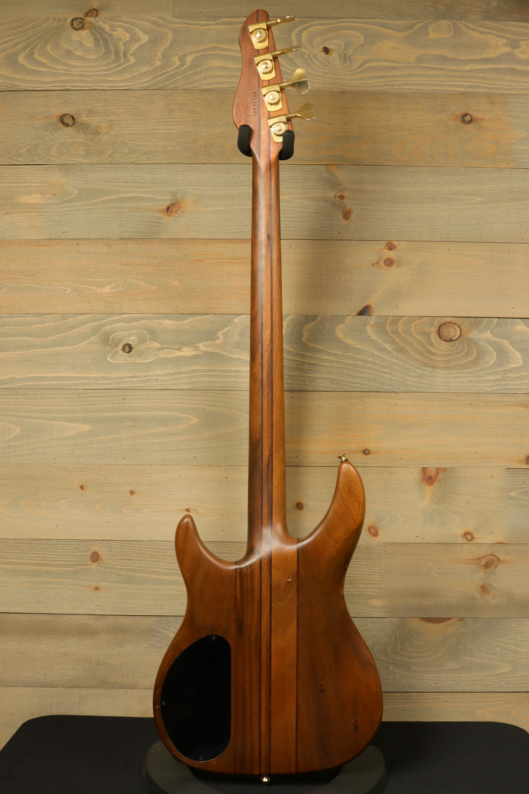 Peavey Vintage Peavey Unity Koa Bass, natural wood finish, back view showcasing the neck and body